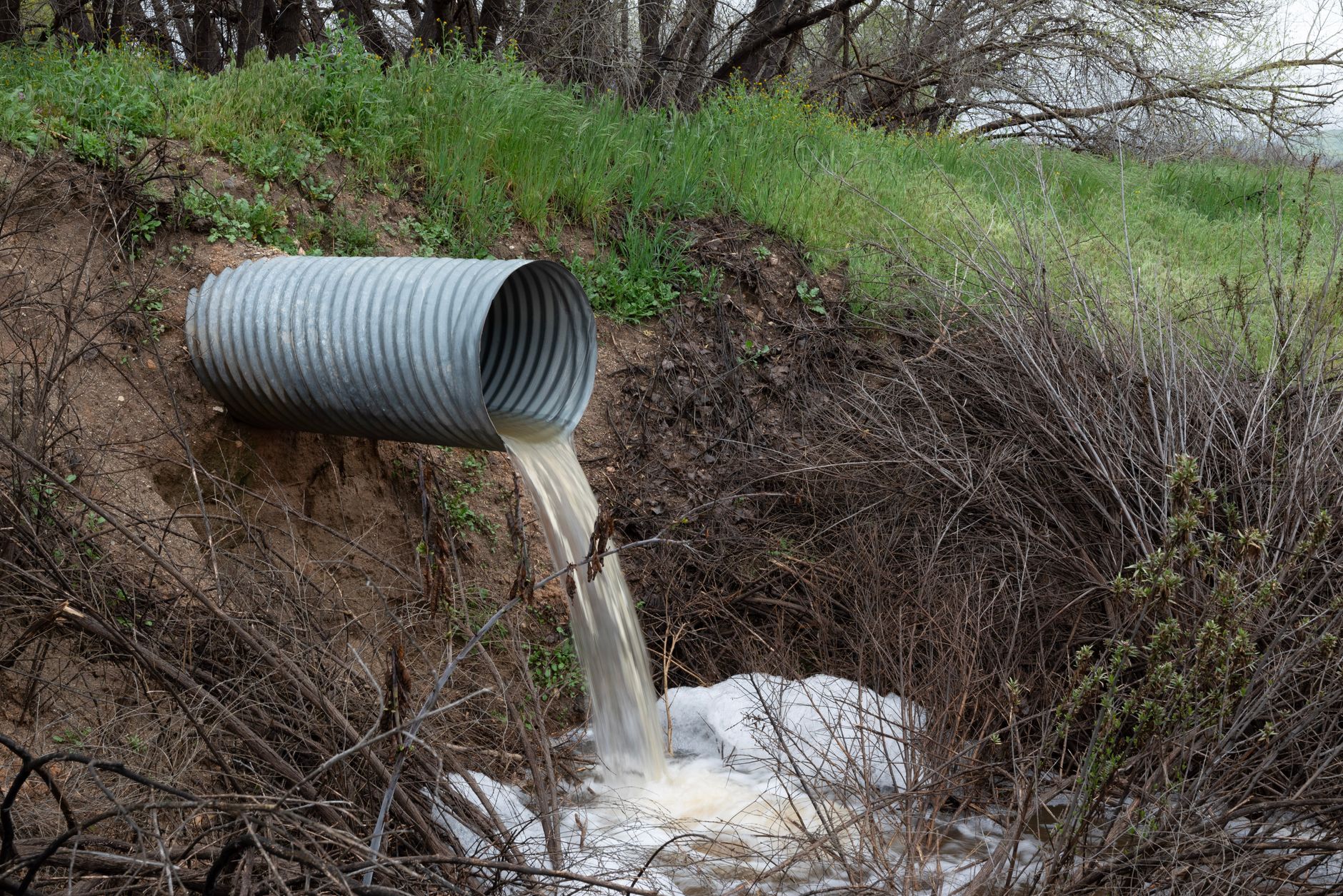 A facility floor drain where recovered cleaning water requires an approved disposal route.