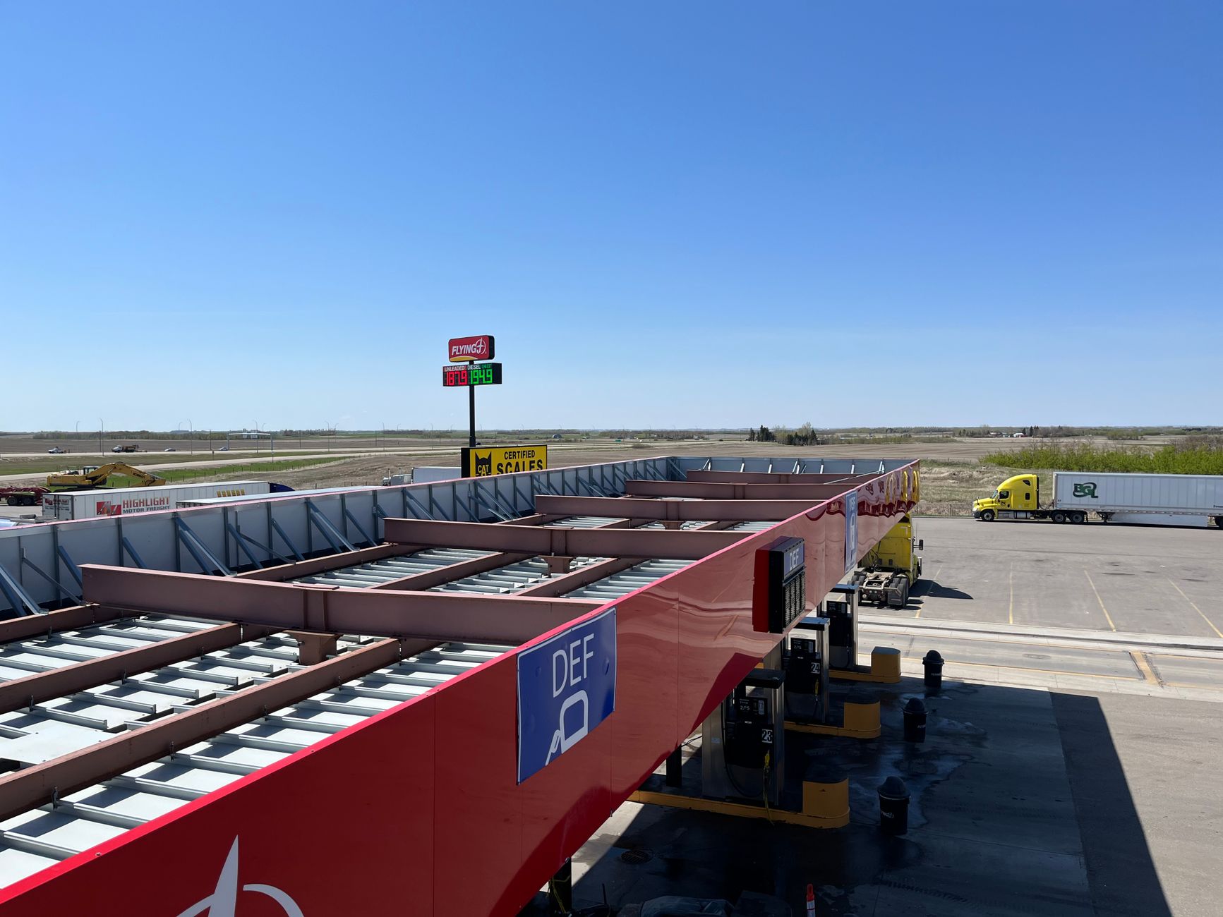 Wide interior view of a highway service building corridor