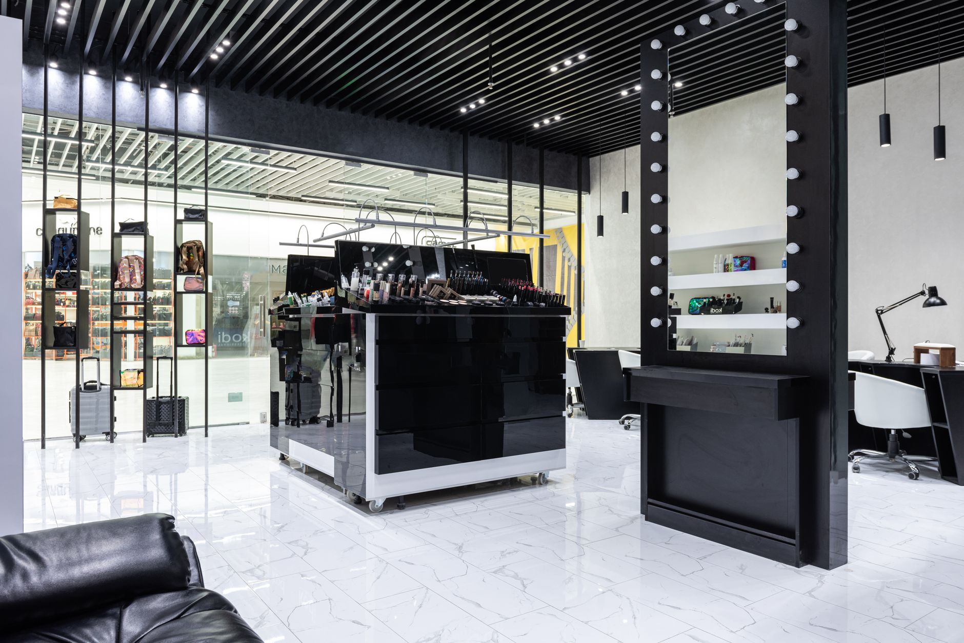 A polished retail floor reflecting consistent automated cleaning coverage.
