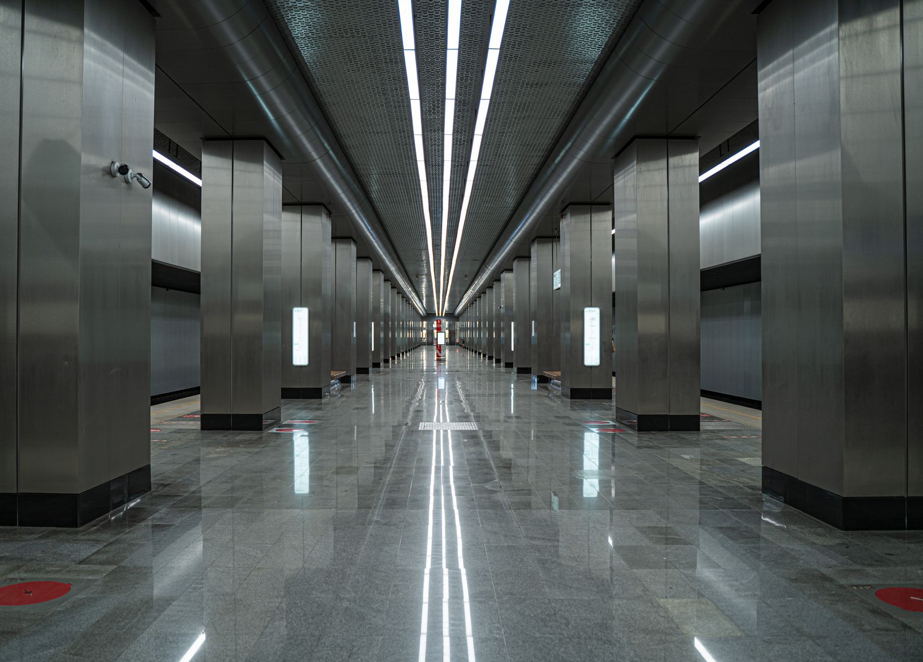 A busy transit concourse where autonomous scrubbers can maintain hard floors between passenger rushes.