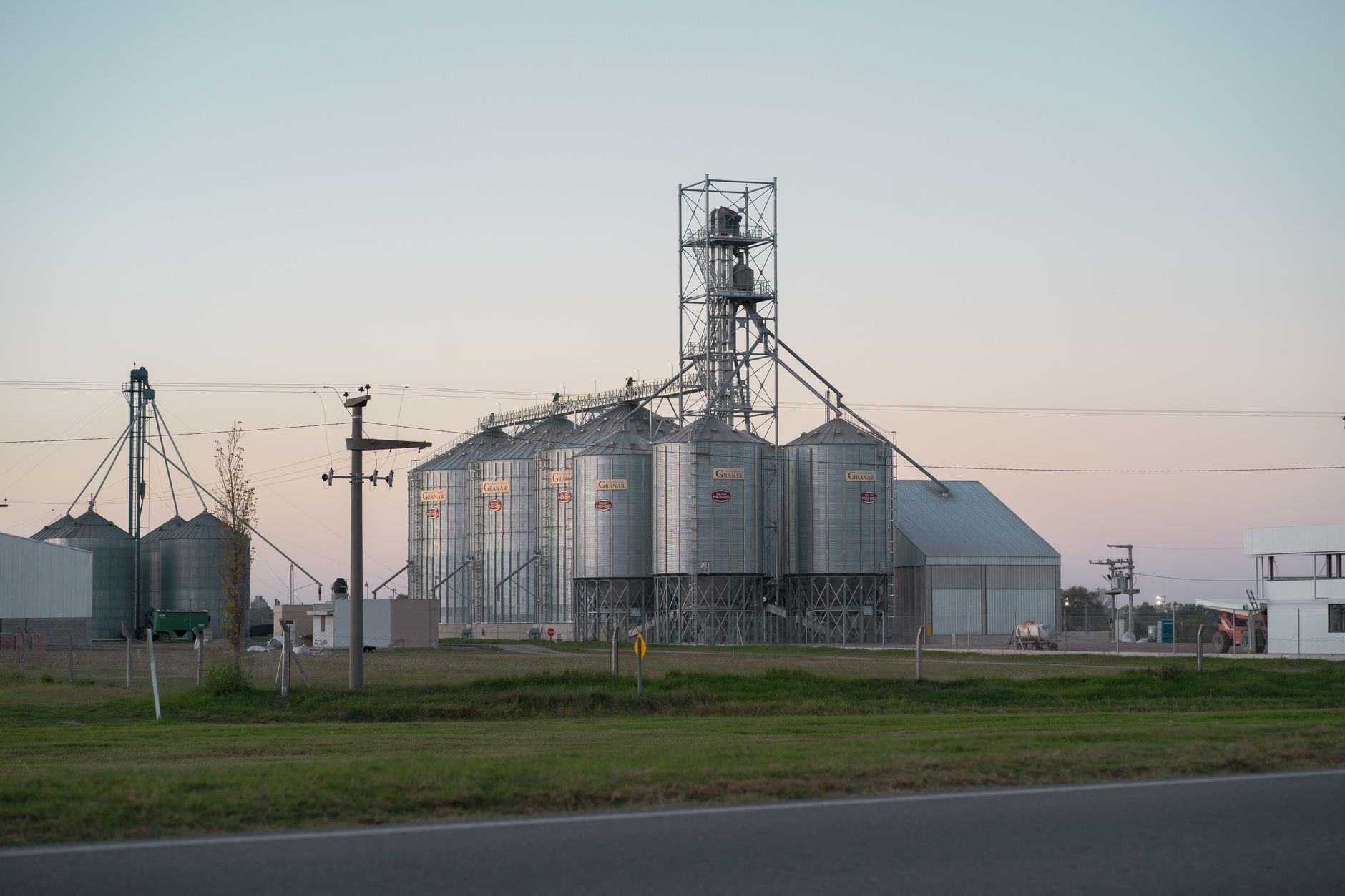 Industrial building at dusk in a rural setting