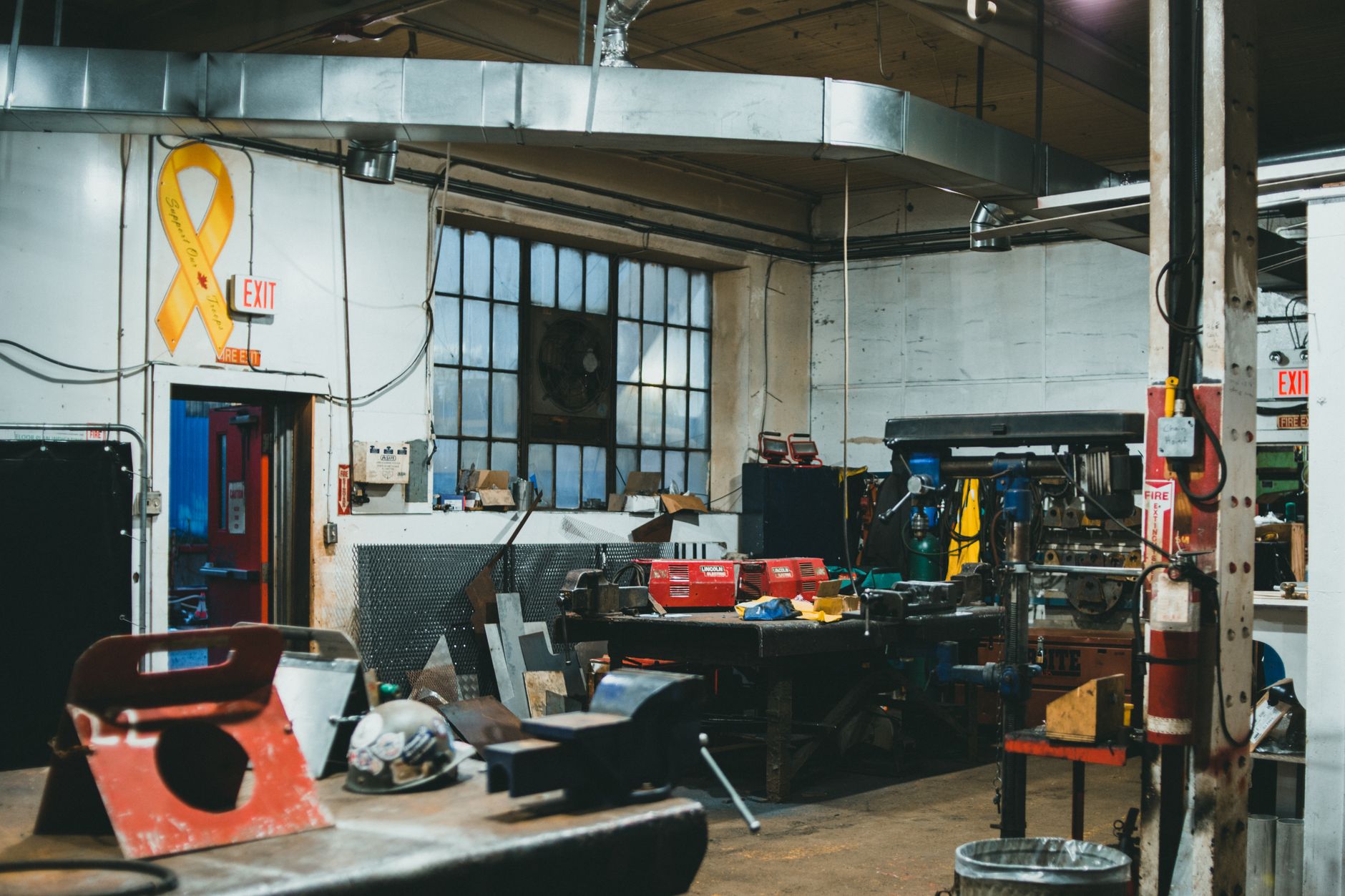 Concrete floor inside a small manufacturing workshop