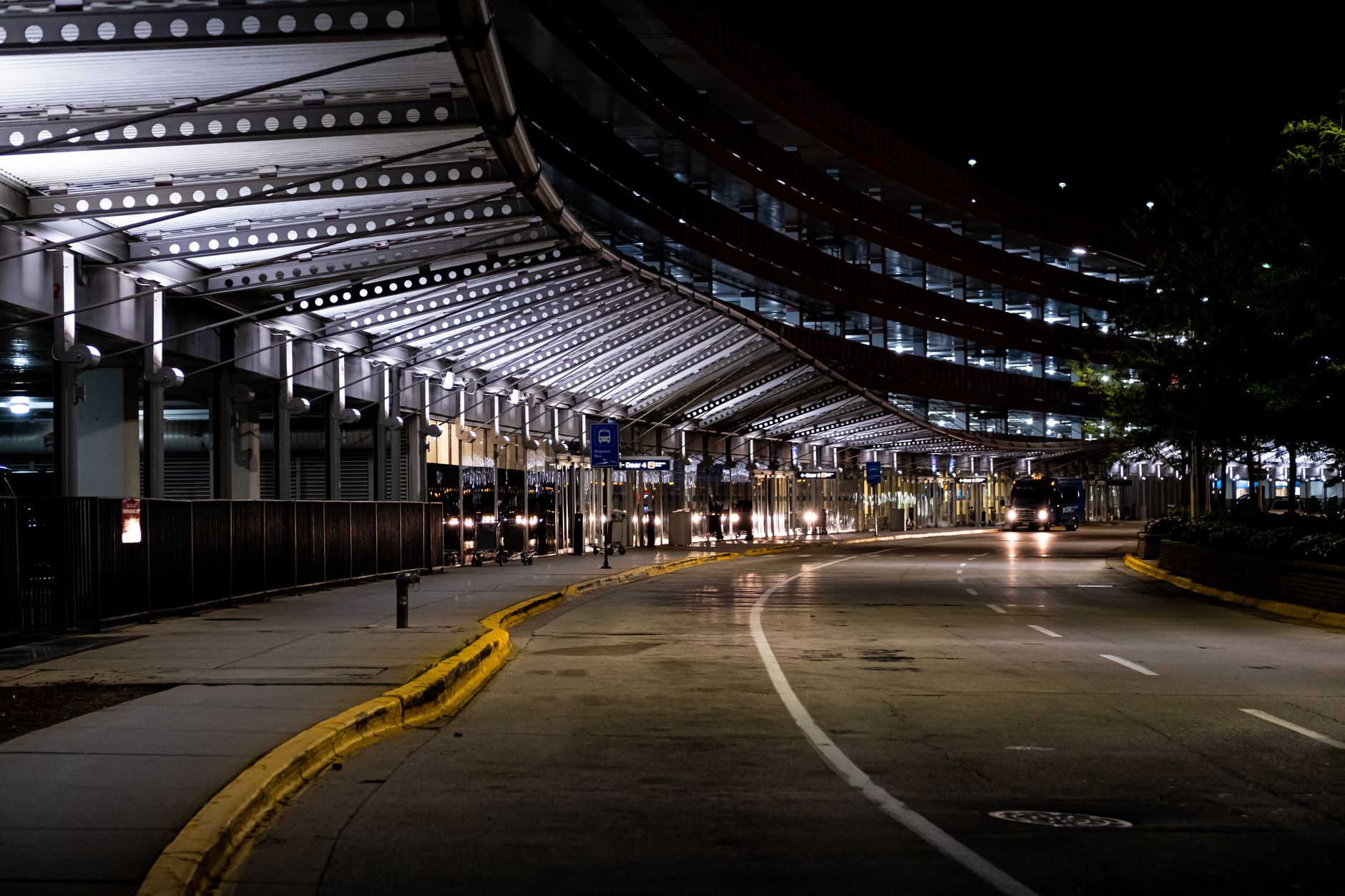 An empty airport terminal at night, illustrating the ideal environment for a scheduled cleaning robot to work without interruption.