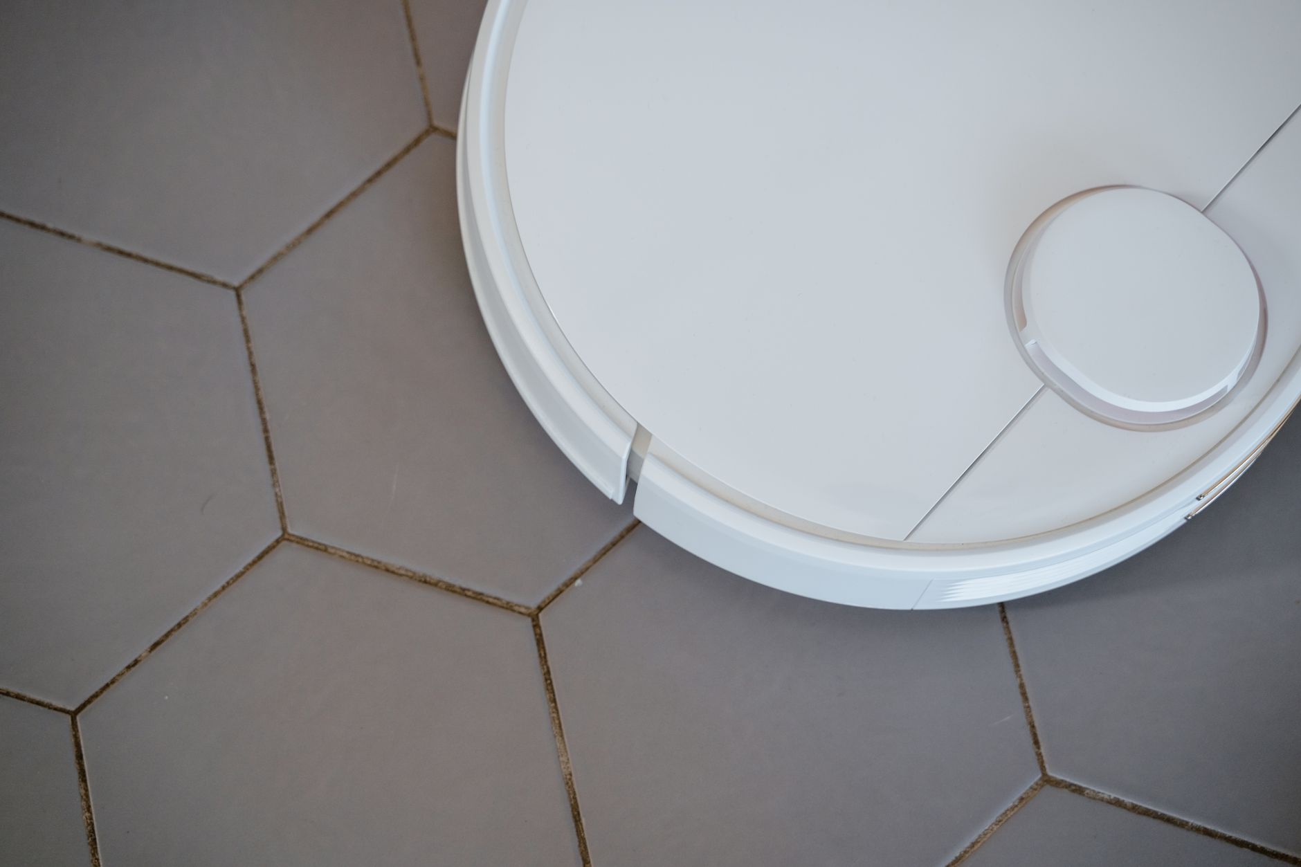 Freshly cleaned tile surface after an overnight scrub cycle on a hospitality floor.