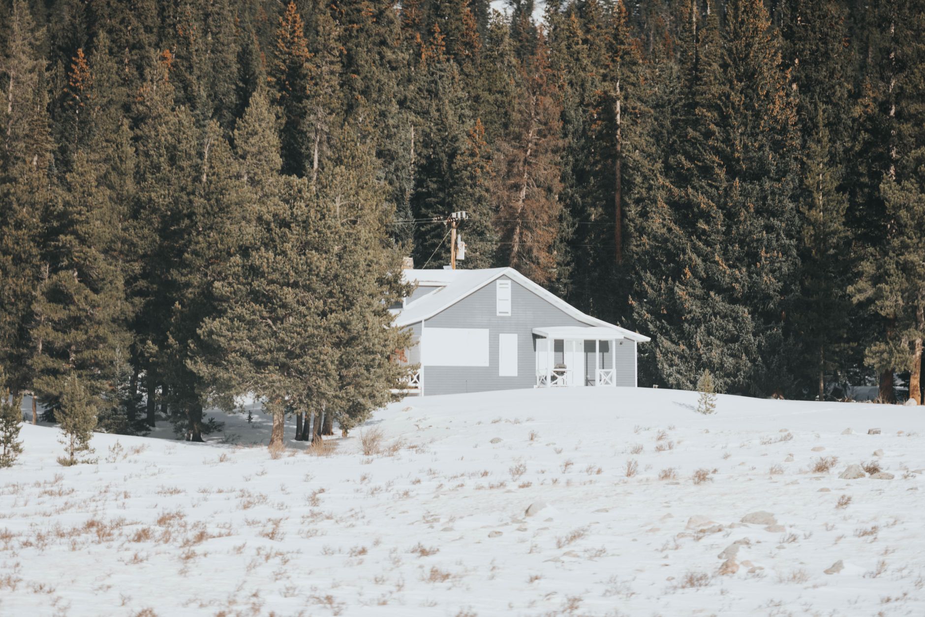 Remote mountain cabin access road where caretaker drive-ups are not always possible.