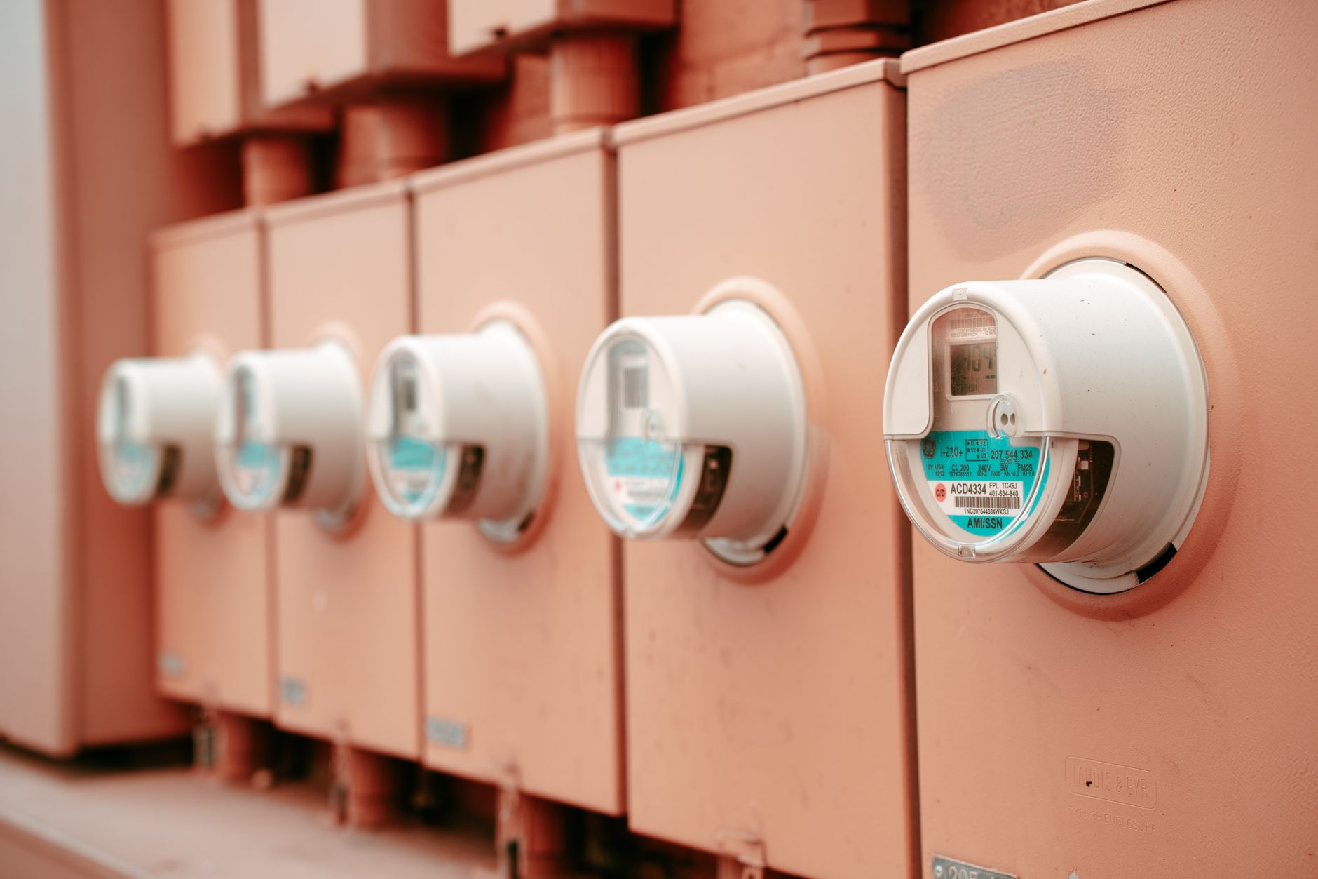 An electrical meter displays operating measurements used to interpret thermal readings in their load context.