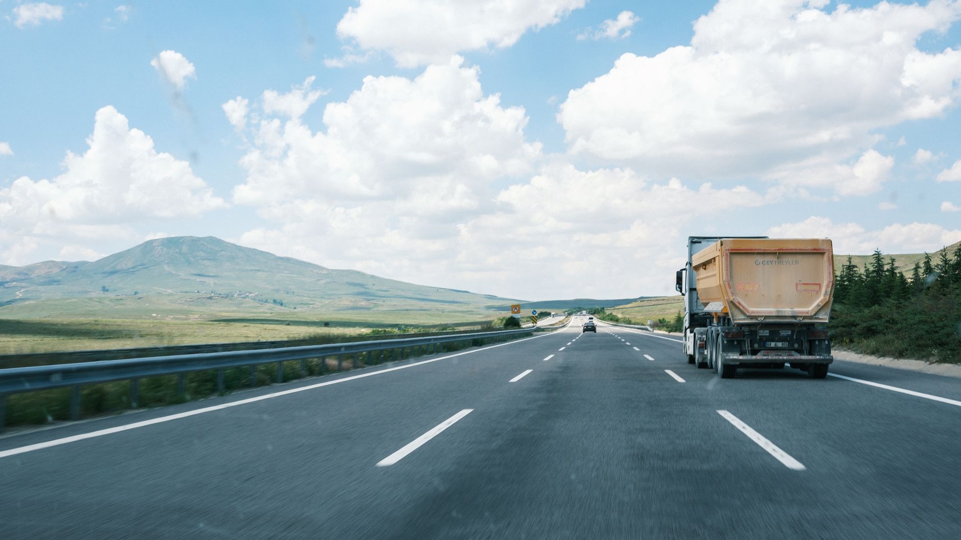 Long highway distance illustrating travel charges when warranty service is far from the site.