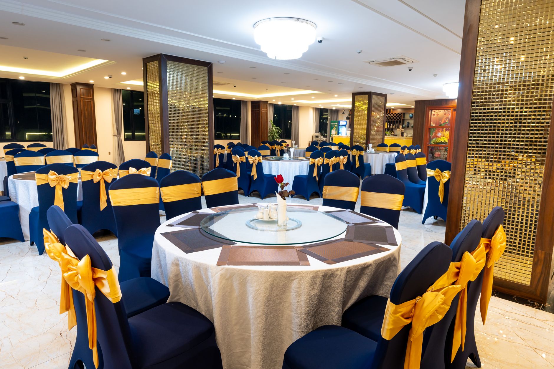 Empty fellowship or event hall with tables and chairs after use, illustrating the turnover cleaning challenge between ministry events.