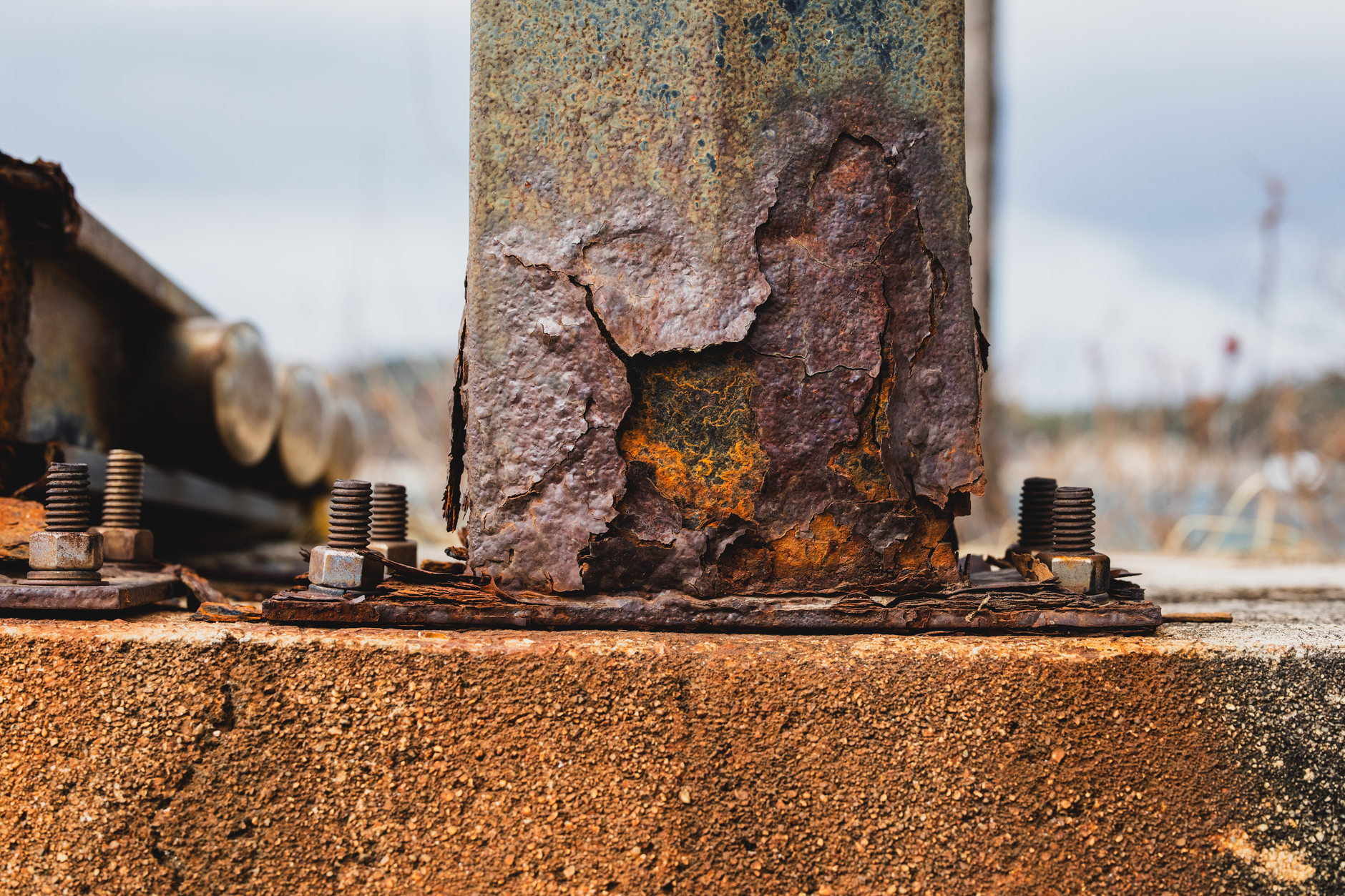 Corroded bolts and steel connections illustrating visible conditions that bearing imagery should document.