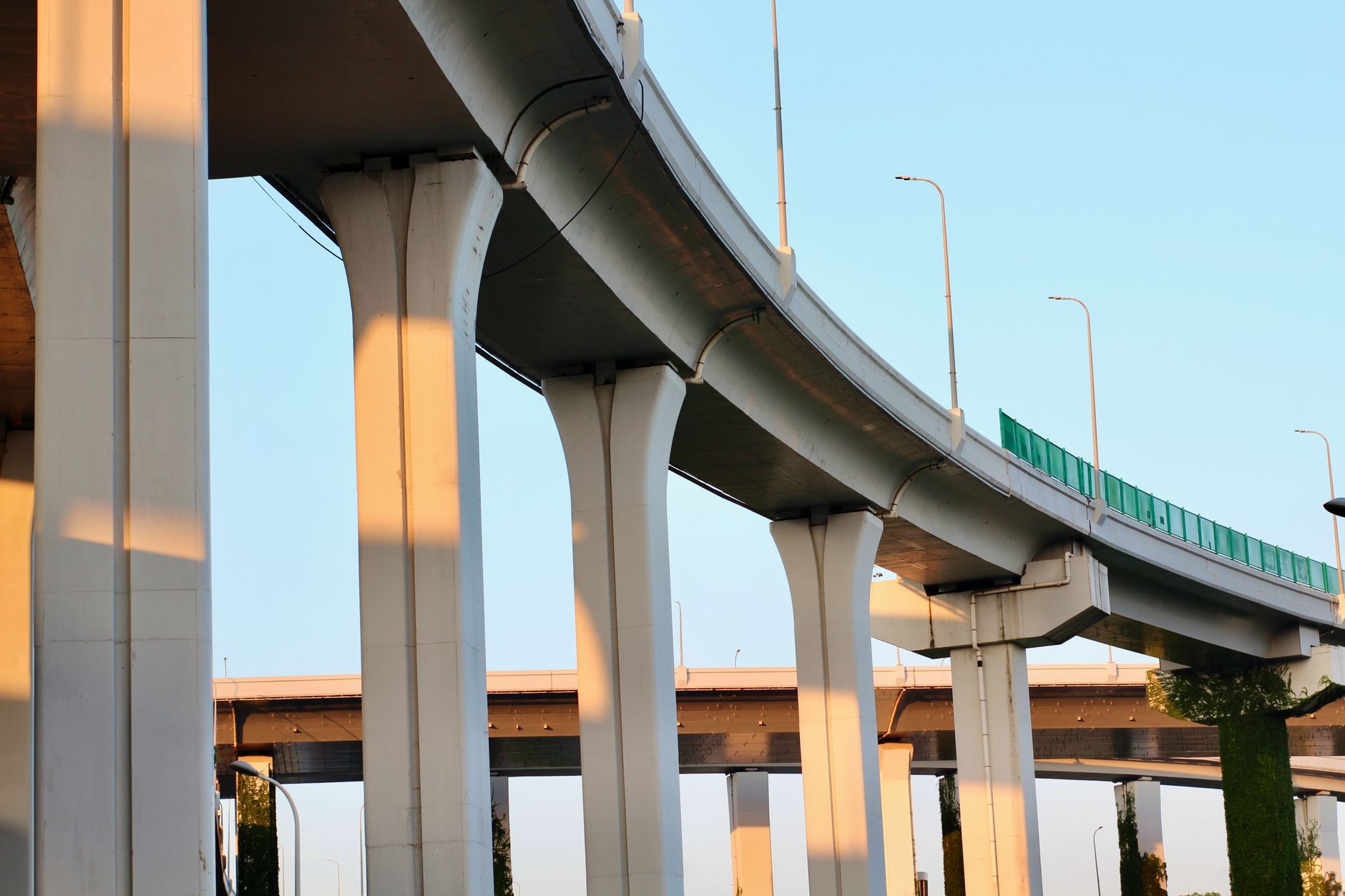 A bridge expansion joint viewed from the roadway, with the seal and surrounding surface clearly visible.