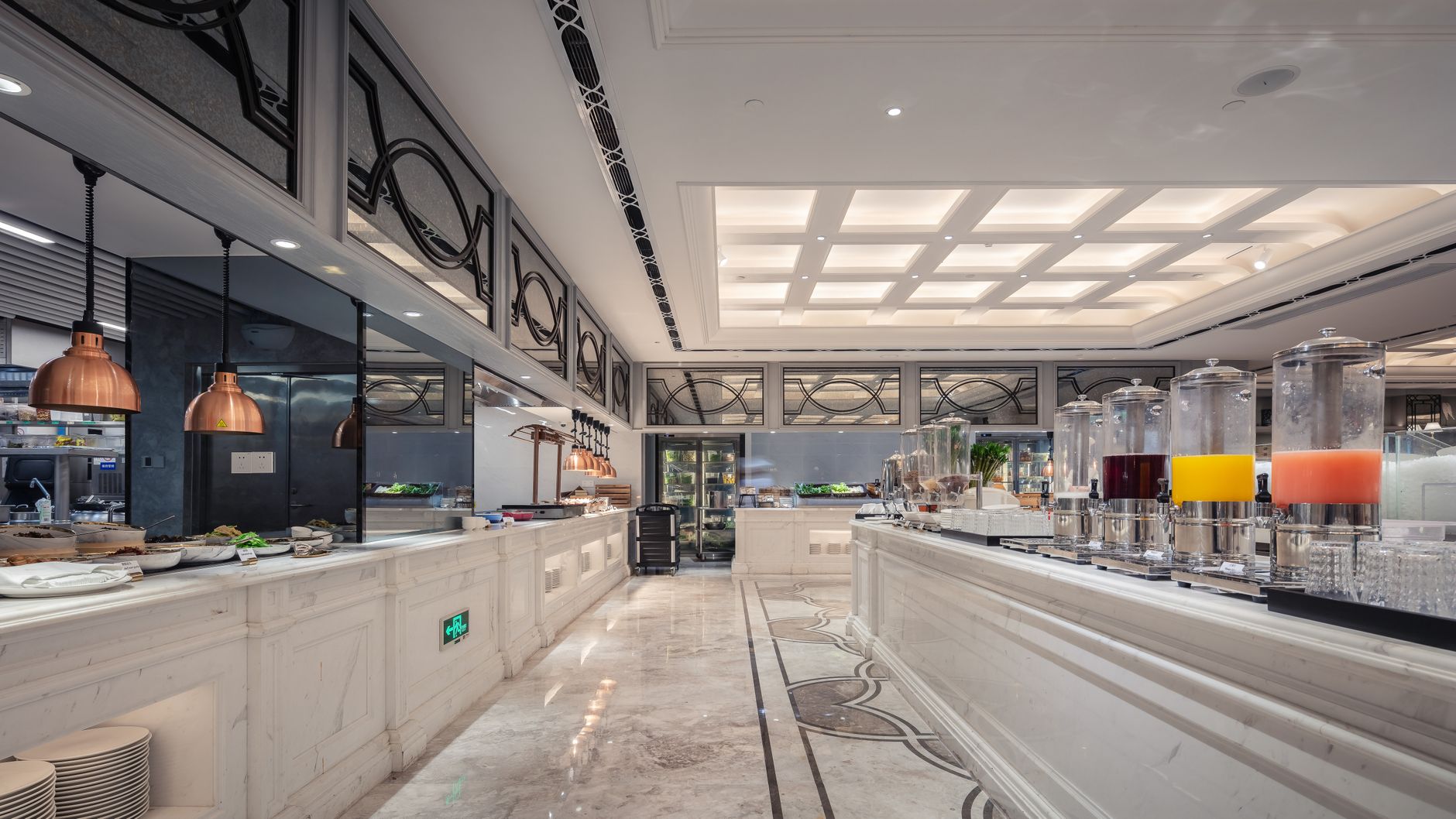 A resort hotel buffet where delivery robots can support tray collection and staff during peak seating.
