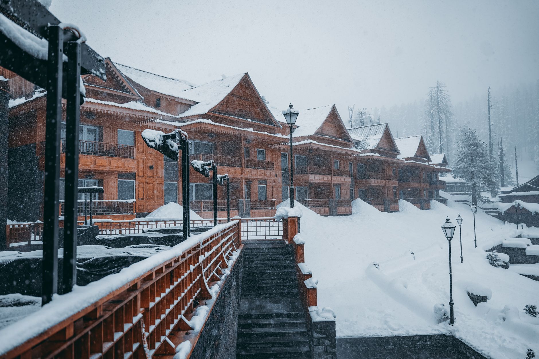 Mountain lodge entryway with porch mats and snow melt near the door