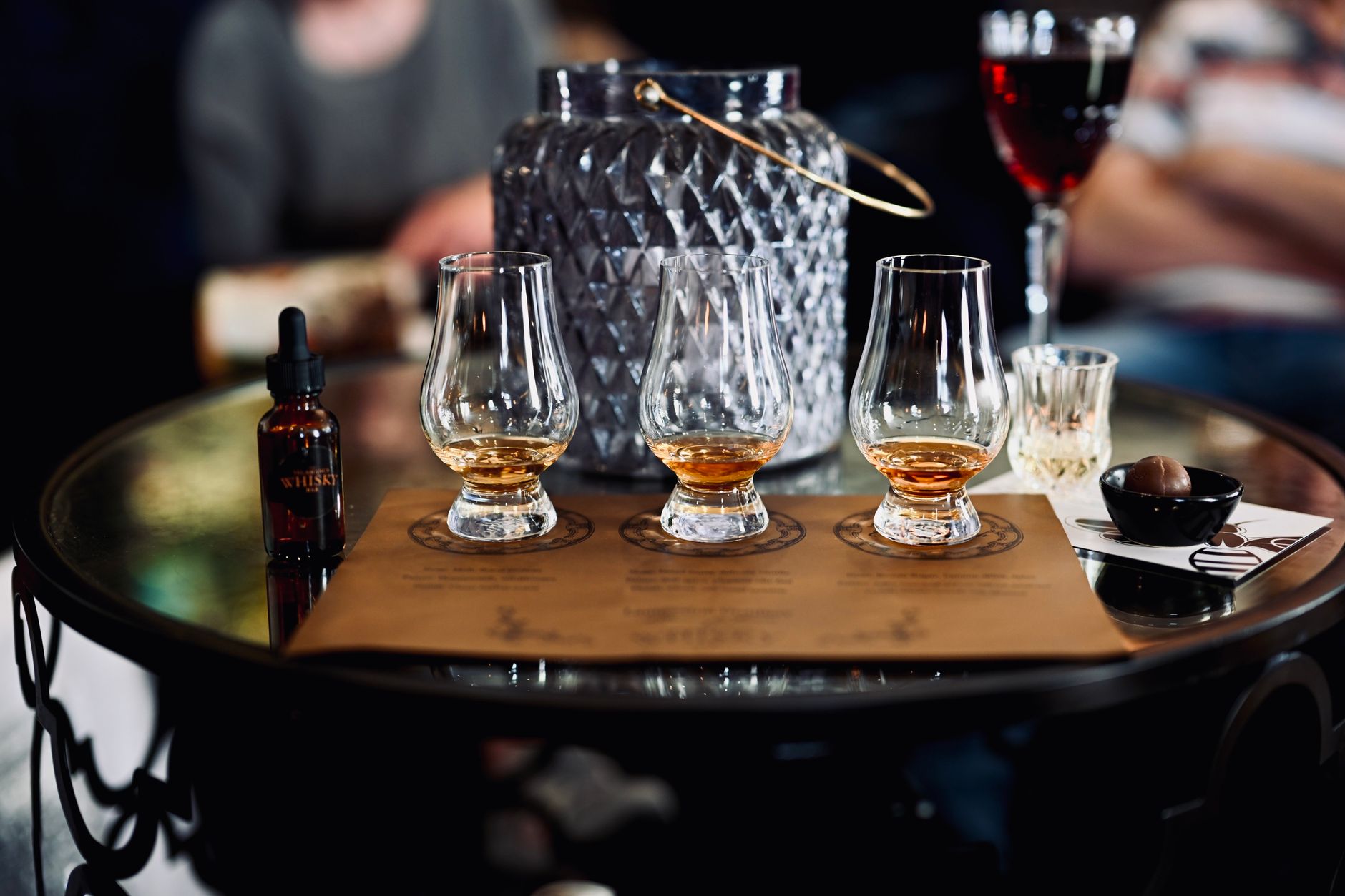 Craft distillery tasting area separate from production, where patrol schedules should respect guest privacy.