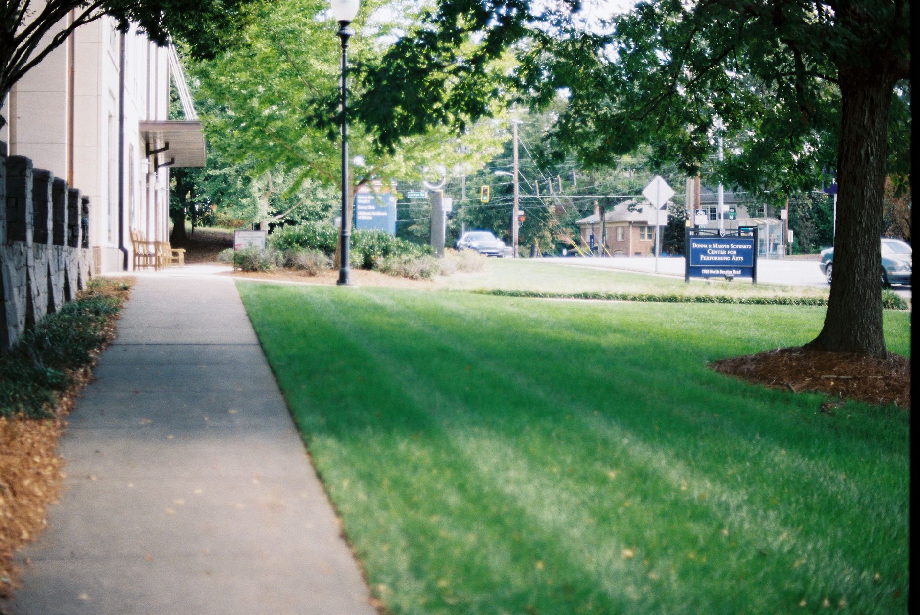 Connected clinic buildings on a medical campus, showing pedestrian paths patrol routes must link after hours.