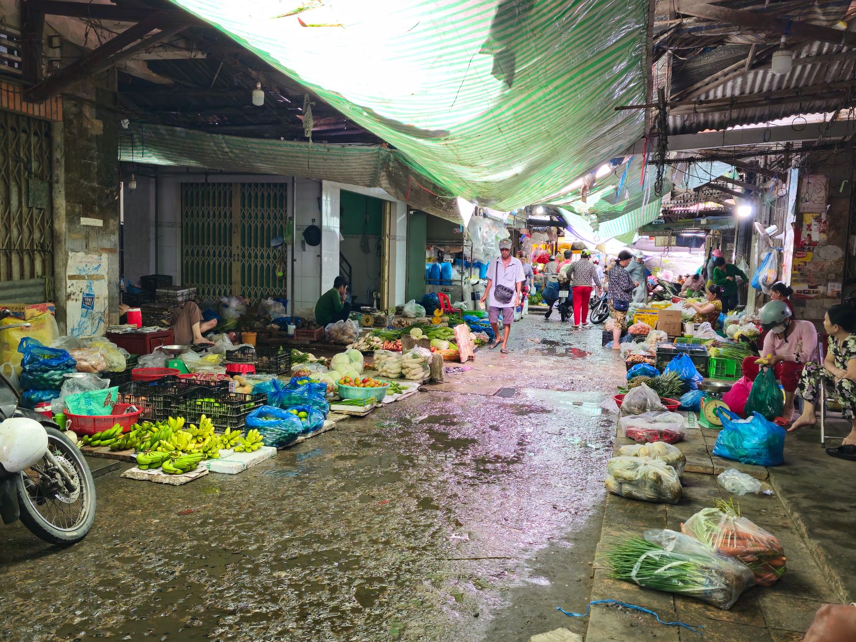 Entry areas where moisture and tracked-in water raise slip risk for shoppers.