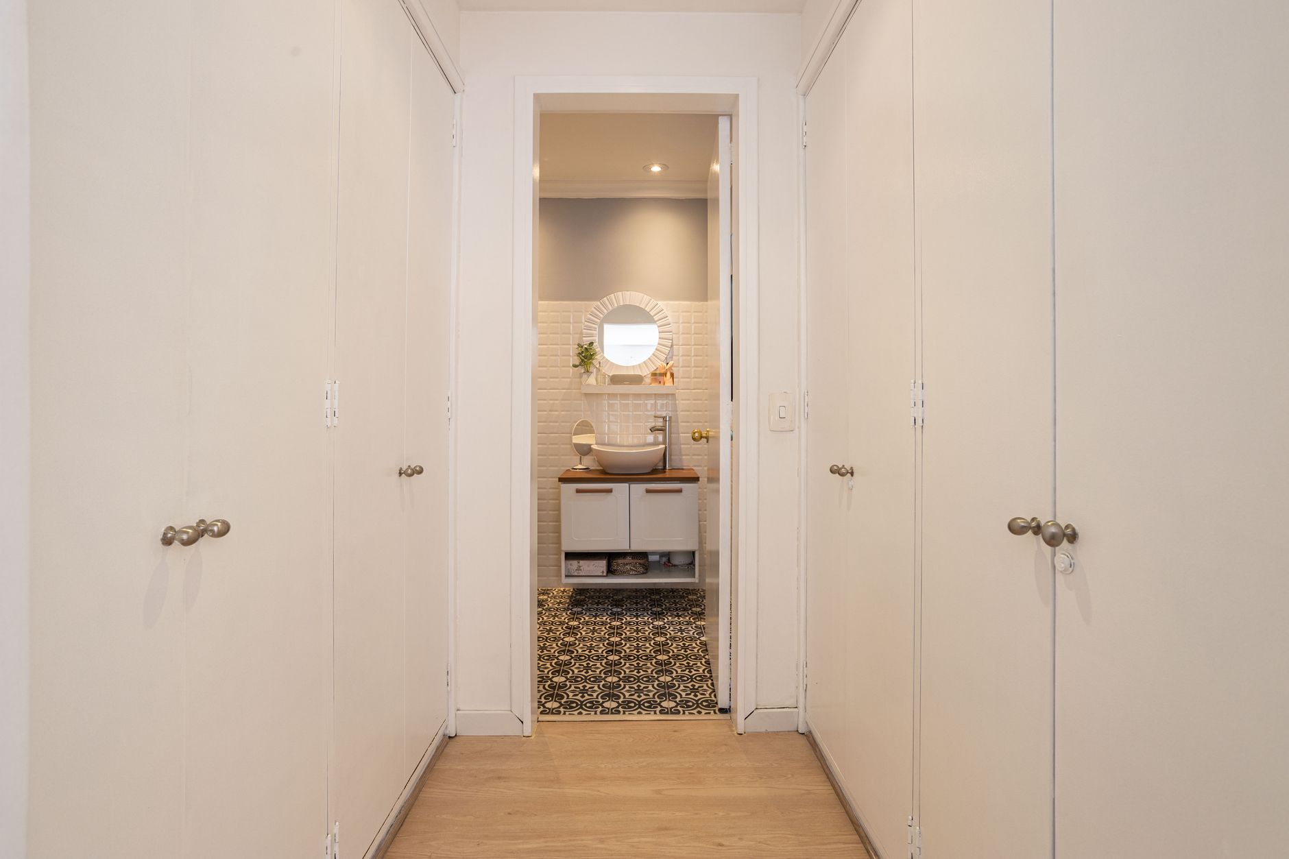Bright indoor corridor in a multi-unit vacation property, showing the kind of controlled route where a narrow service pilot is most realistic.