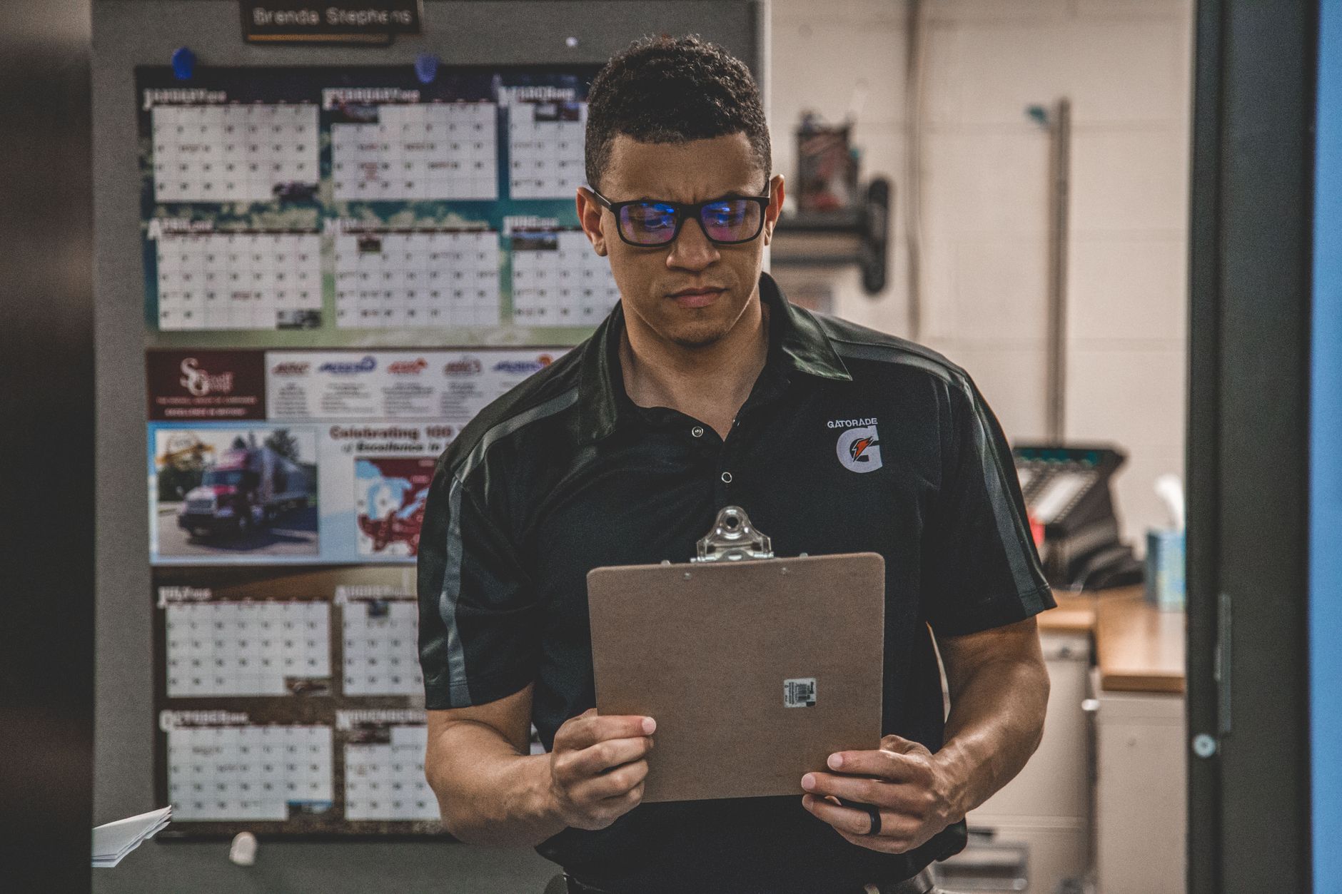 A warehouse manager reviewing dock activity underscores the buyer focus on deployment planning, support, and service accountability.