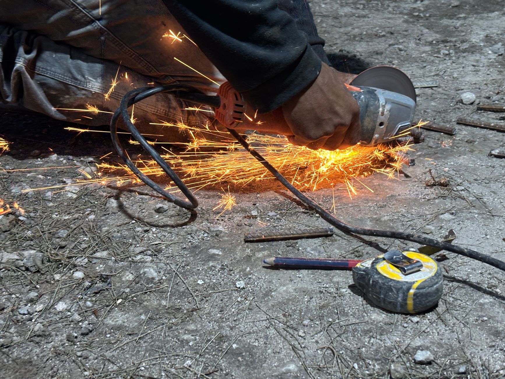 A selection of abrasive wheels and discs used for deburring and finishing metal parts.
