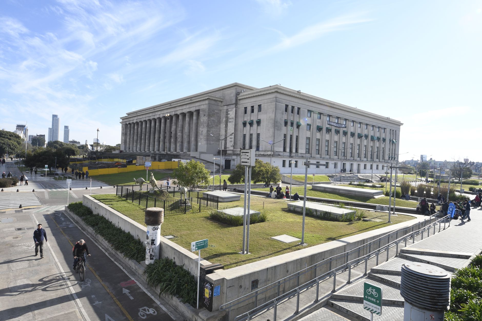 Pedestrian plaza and walkways on a corporate campus where mowing zones need clear boundaries.