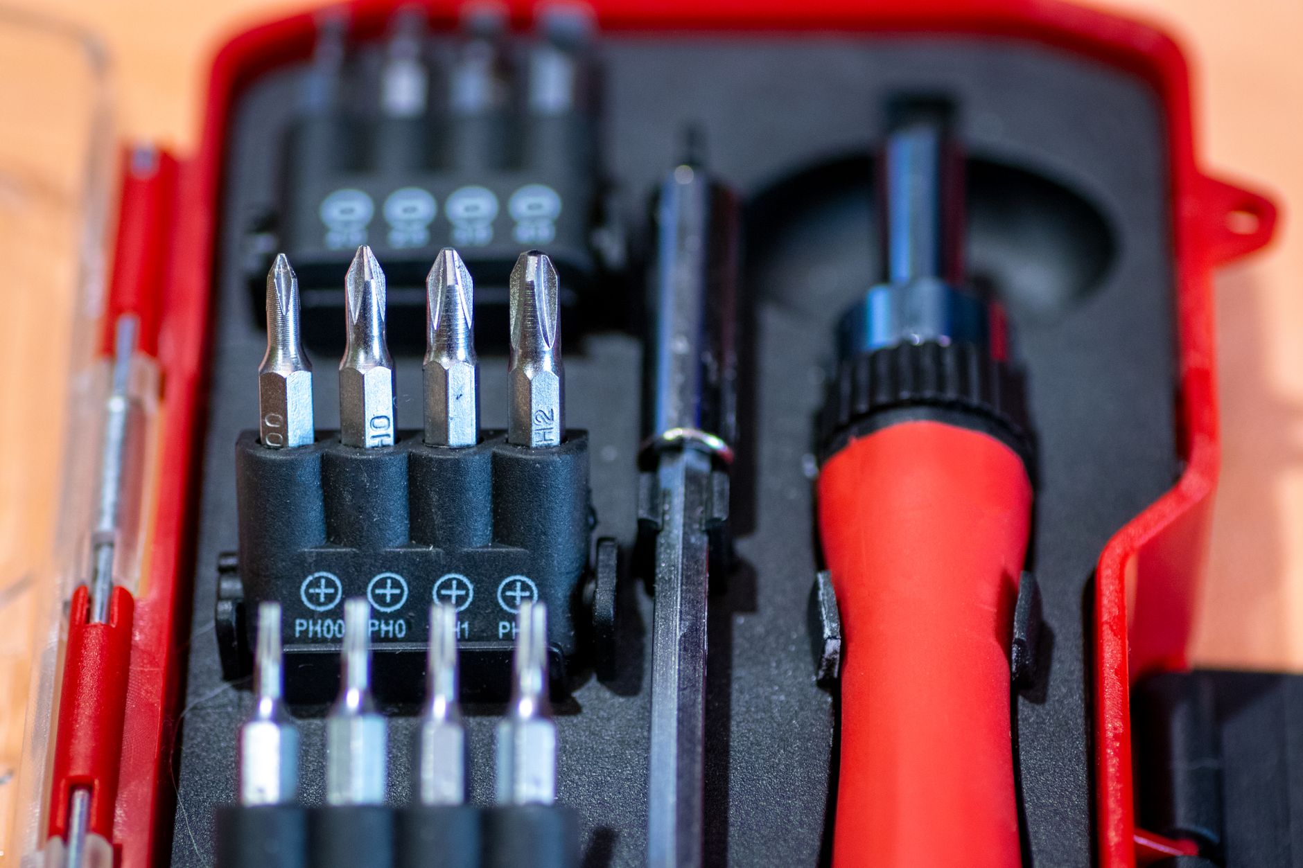 A technician's open tool kit, illustrating the need for a separate service and maintenance plan for an owned robot fleet.