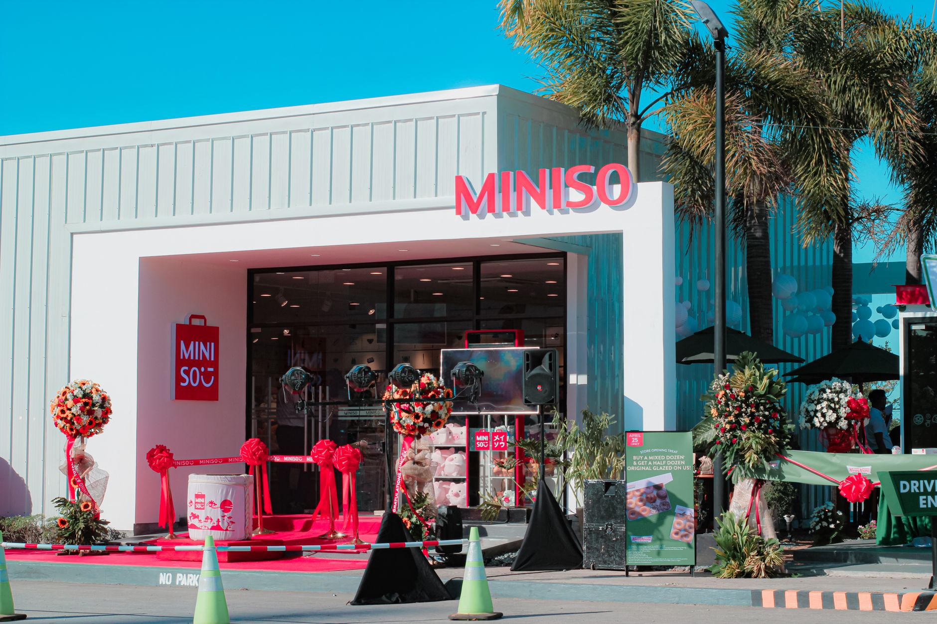 Decorated retail storefront during a grand opening week