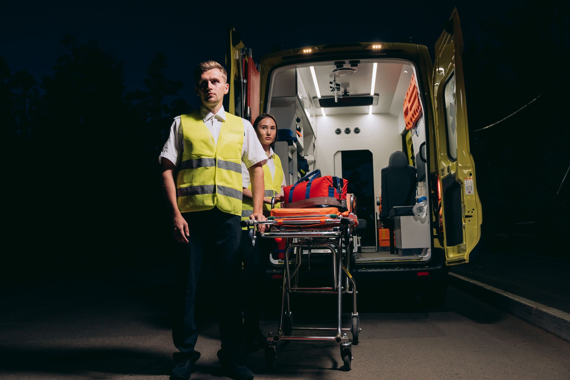 Dimly lit patient hallway at night when environmental services teams schedule quiet floor care.