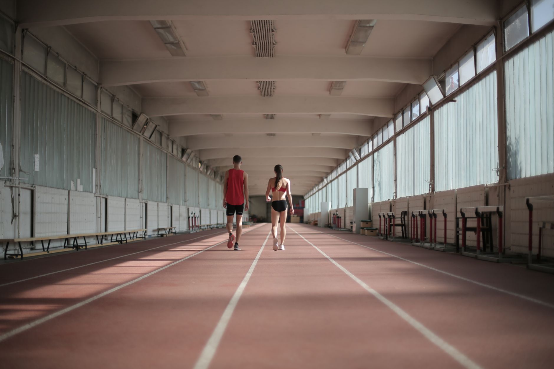 Indoor walking track with clear perimeter edges and entry points, matching the looped routes described for YMCA overnight floor care.