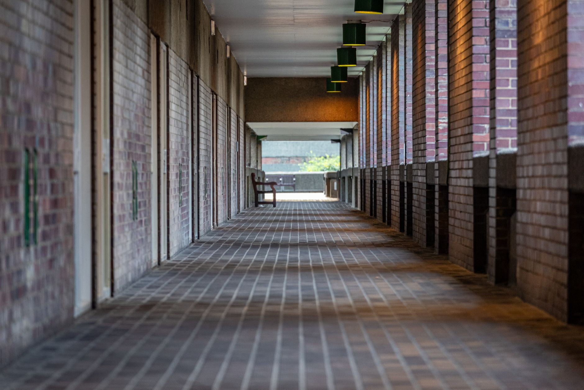 A busy public building corridor like the civic sites where three-year restroom automation contracts are underwritten.