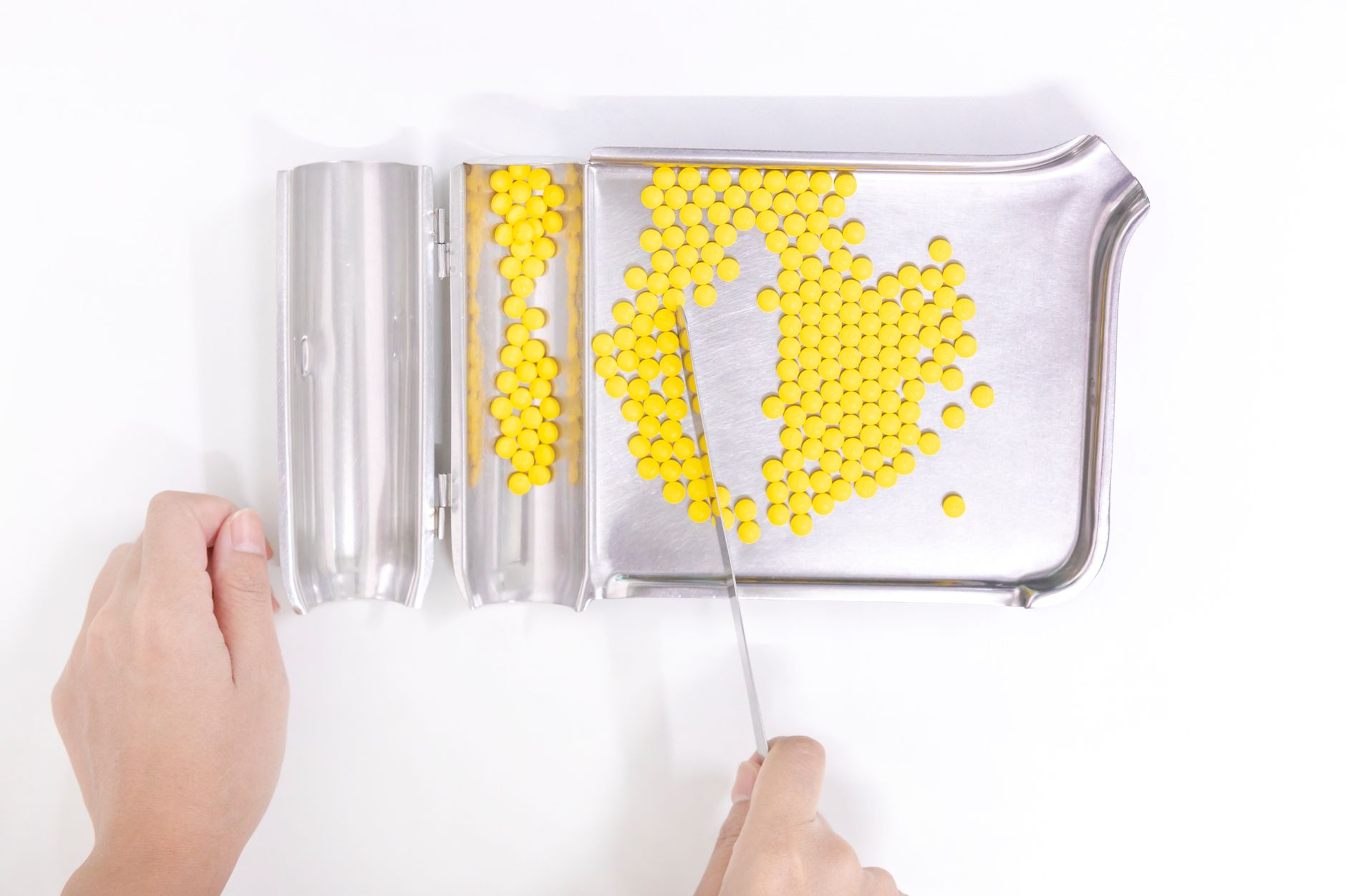 Hospital pharmacy staff preparing medication in a clinical setting