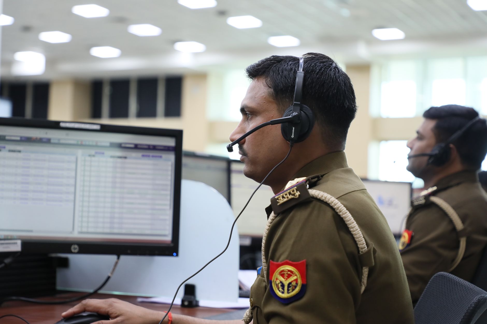 An operations desk with screens and staff, reflecting the local monitoring and response capacity required to keep a deployment compliant in public space.