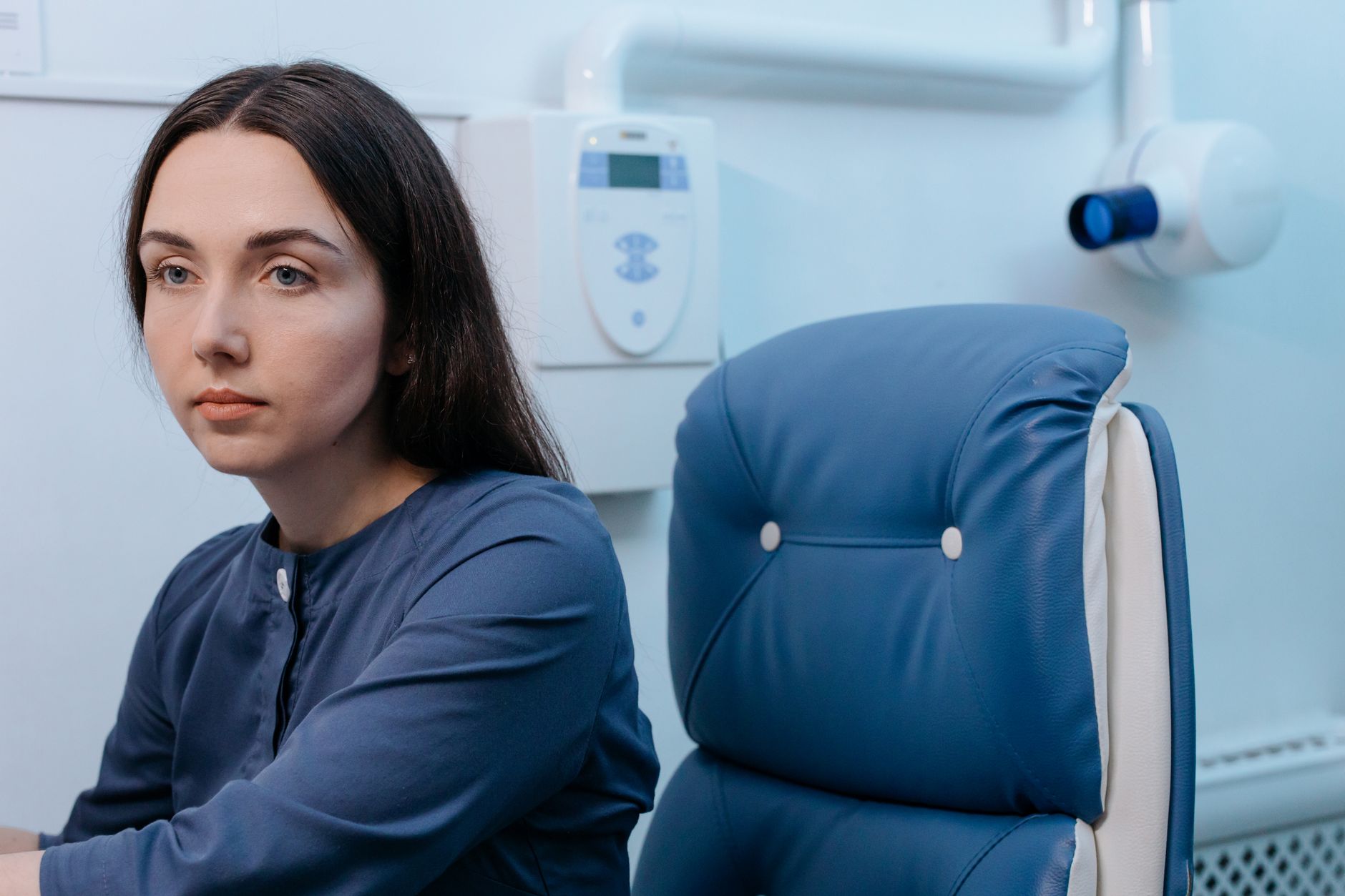 A standard outpatient exam space reinforces that patient comfort and familiar clinic flow will shape acceptance of robotic blood draws.