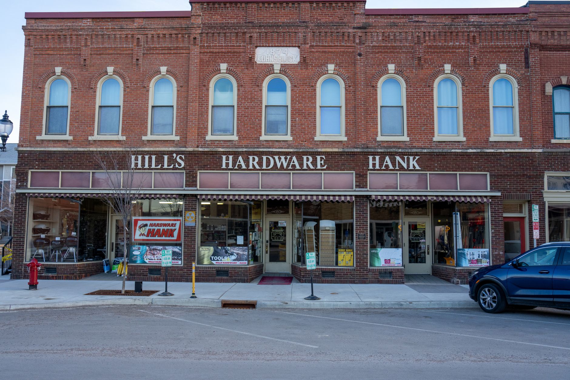A small-town retail storefront that reflects the higher stakes of stock accuracy when shoppers have few nearby alternatives.