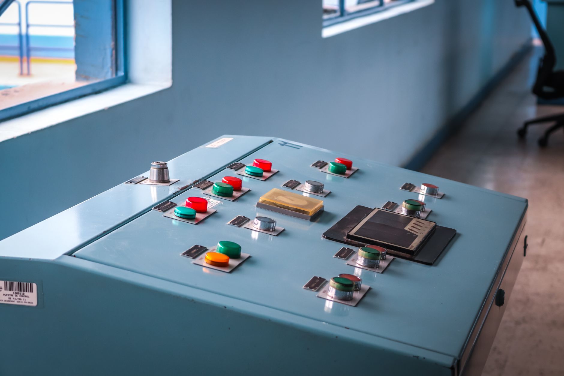 A close-up of a complex industrial machine's control panel, symbolizing the process of offline troubleshooting and diagnostics in a digital twin.