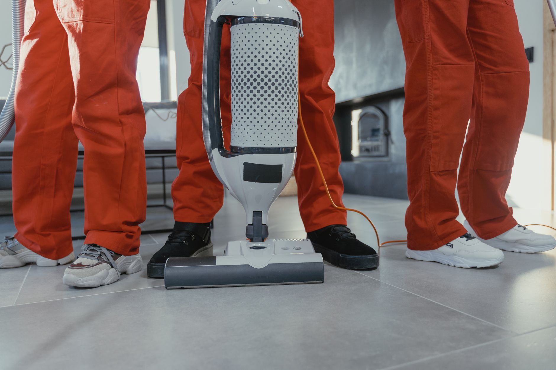 Cleaning staff receiving training in a retail back room