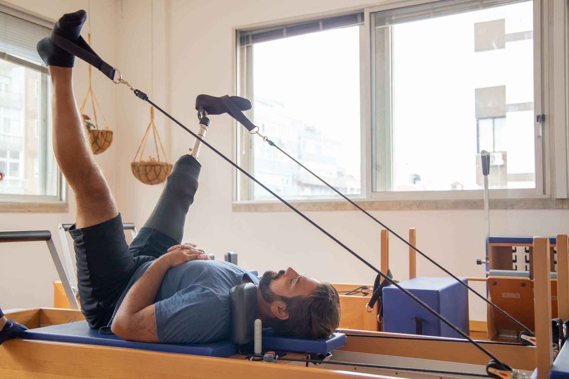 A rehabilitation therapy space where residents receive hands-on mobility support throughout the day.