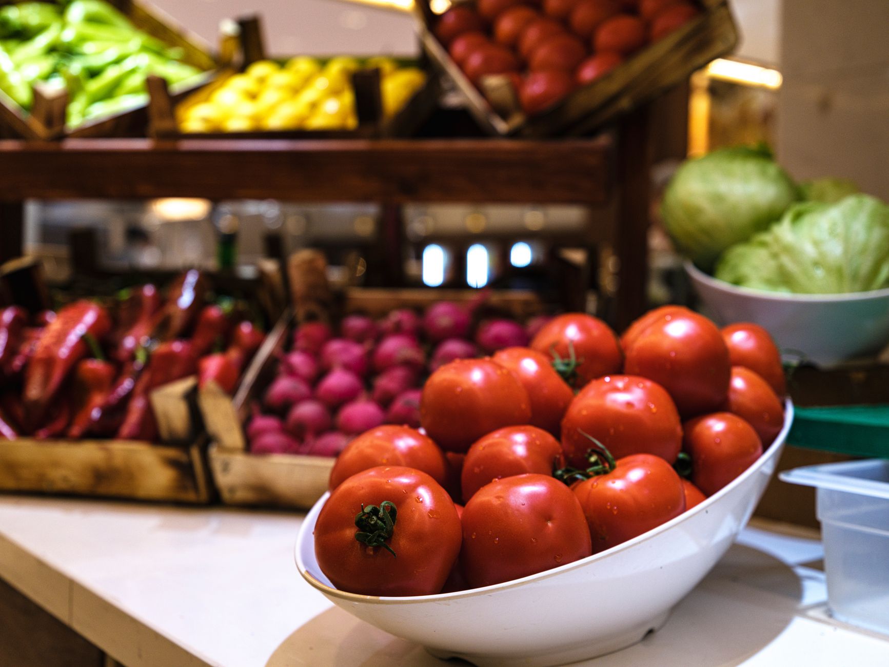 Hotel marketplace shelves with snacks and sundries, representing the ancillary purchases this kind of delivery program can help capture.