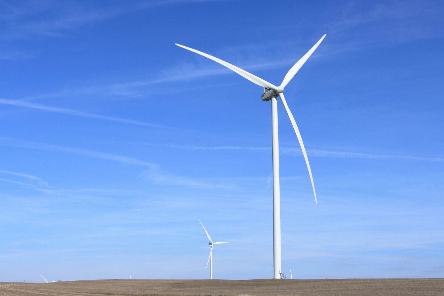 A close view of wind turbine blades highlights the exterior surfaces assessed, prepared, and coated during leading-edge repair.