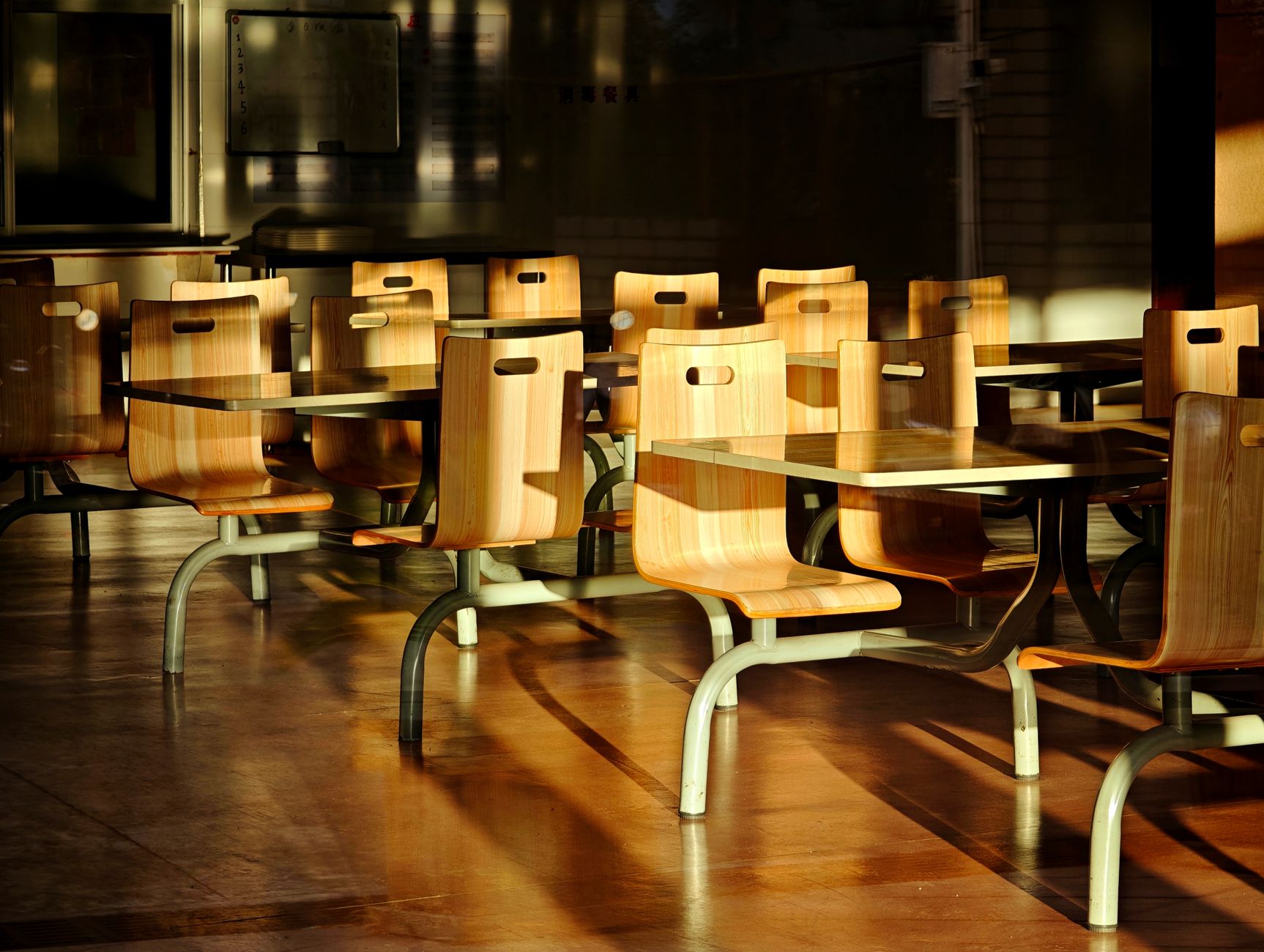 Clean, high-traffic school floor in a large shared space, representing the measurable coverage and labor reallocation described in the results.