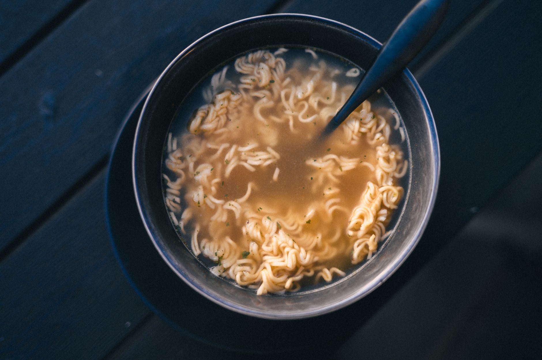 Prepared noodle meals like those sealed on a high speed food manufacturing line.