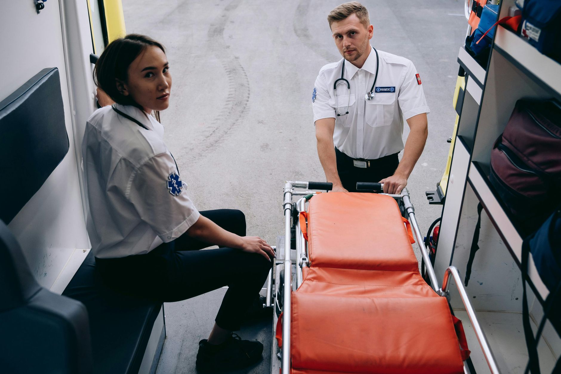 Clinicians take part in staff training inside a hospital therapy space.