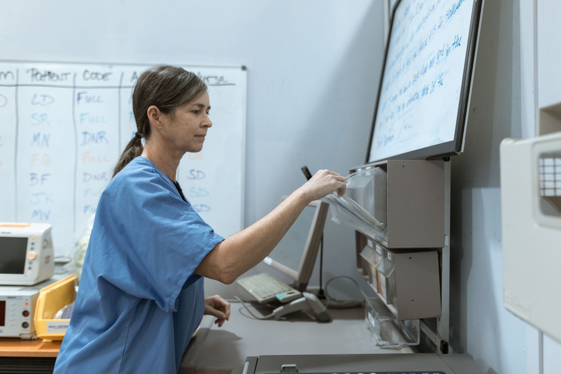 A hospital nurse station supports the buyer takeaway that clear handoff ownership matters as much as transport speed.