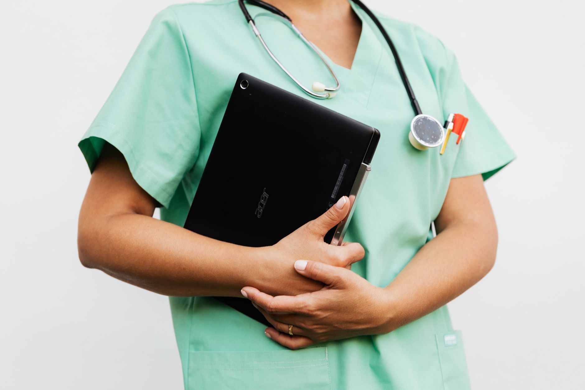 Clinical staff managing workflows from outside a treated room