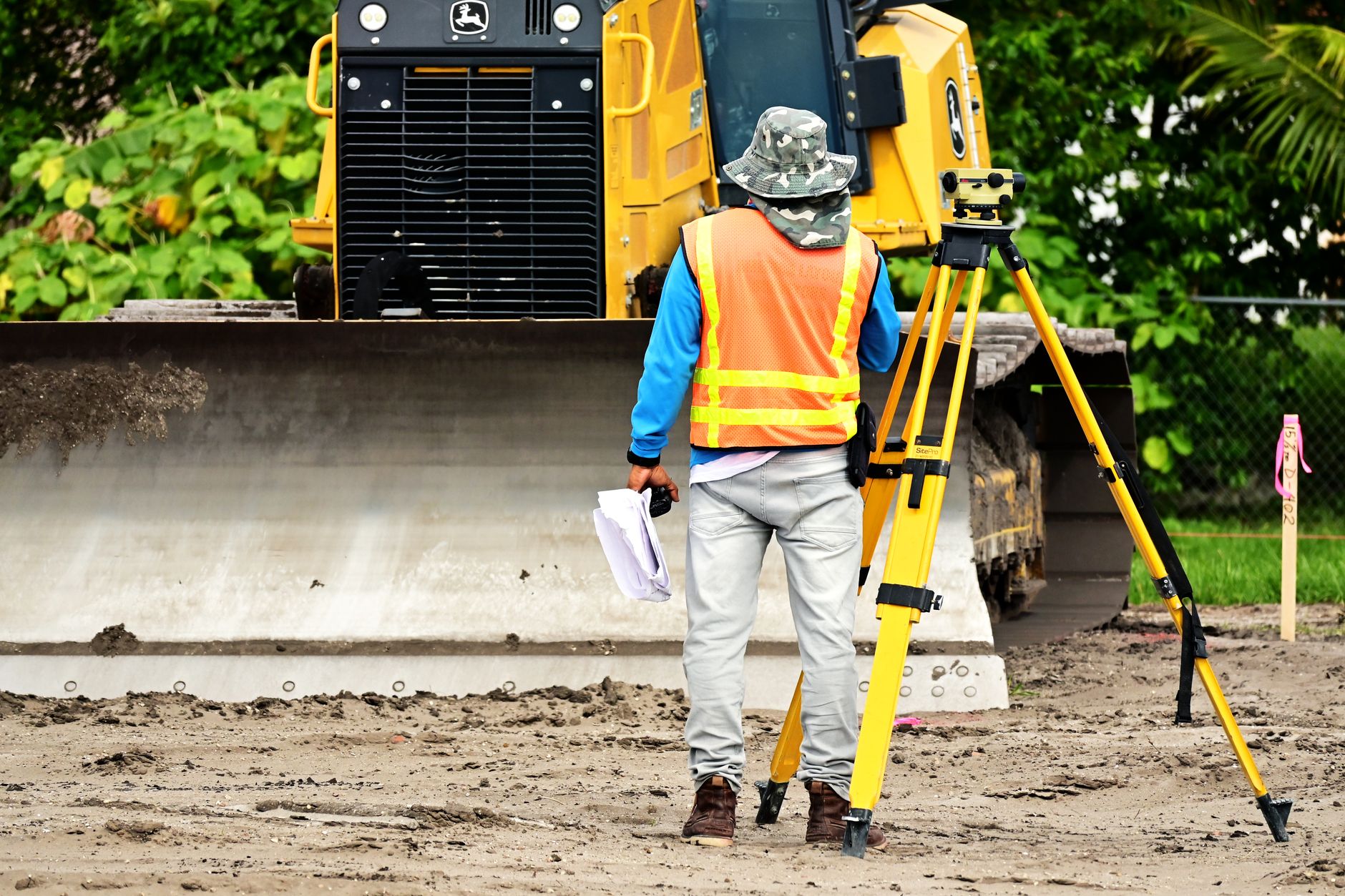 Engineers assess an industrial facility while planning whether an operating tank is suitable for in-service inspection.