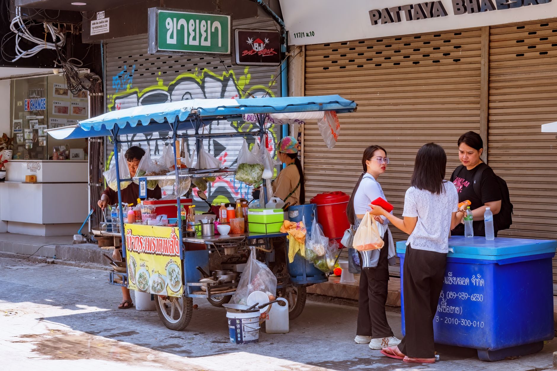Meal carts staged at a kitchen release point before floor delivery