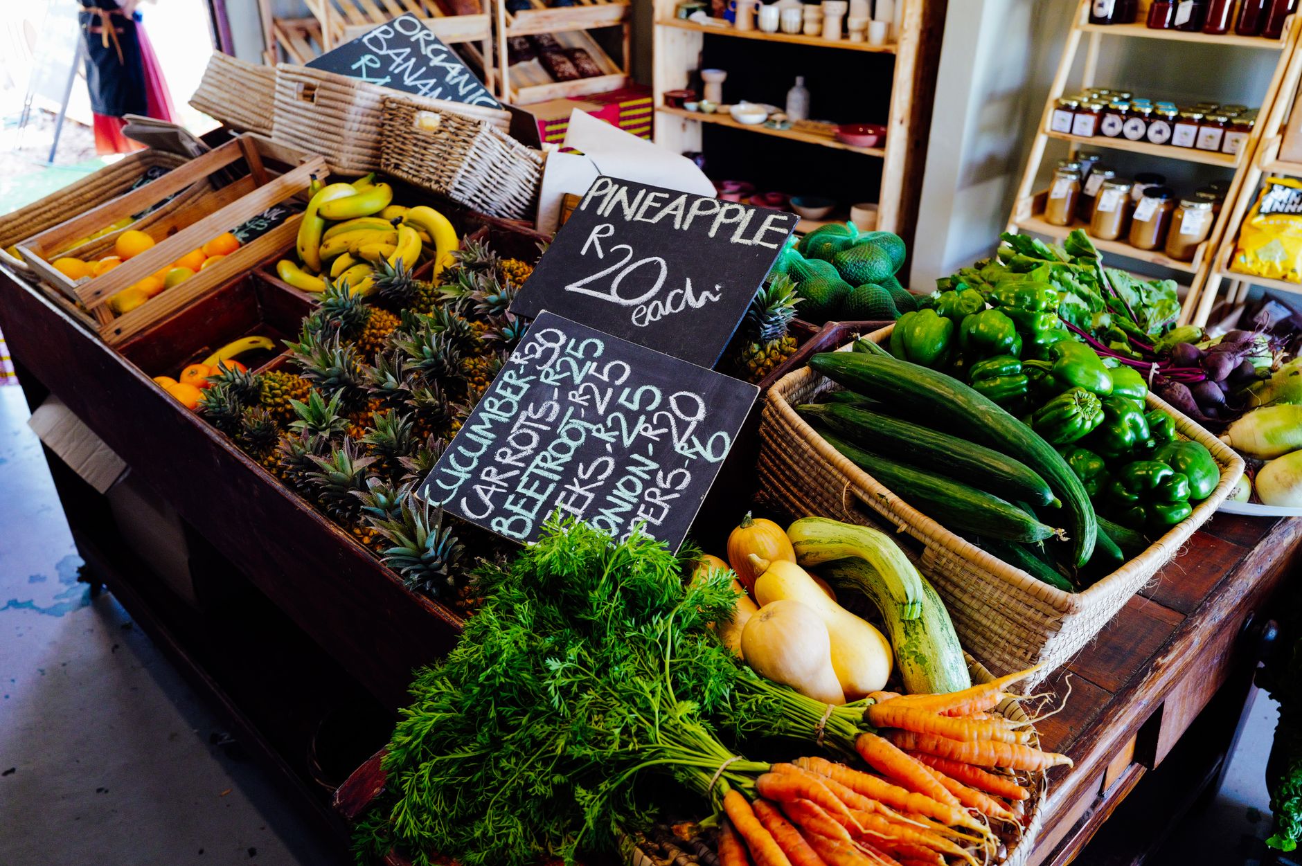Freshly harvested carrots fill produce crates at a commercial farm.