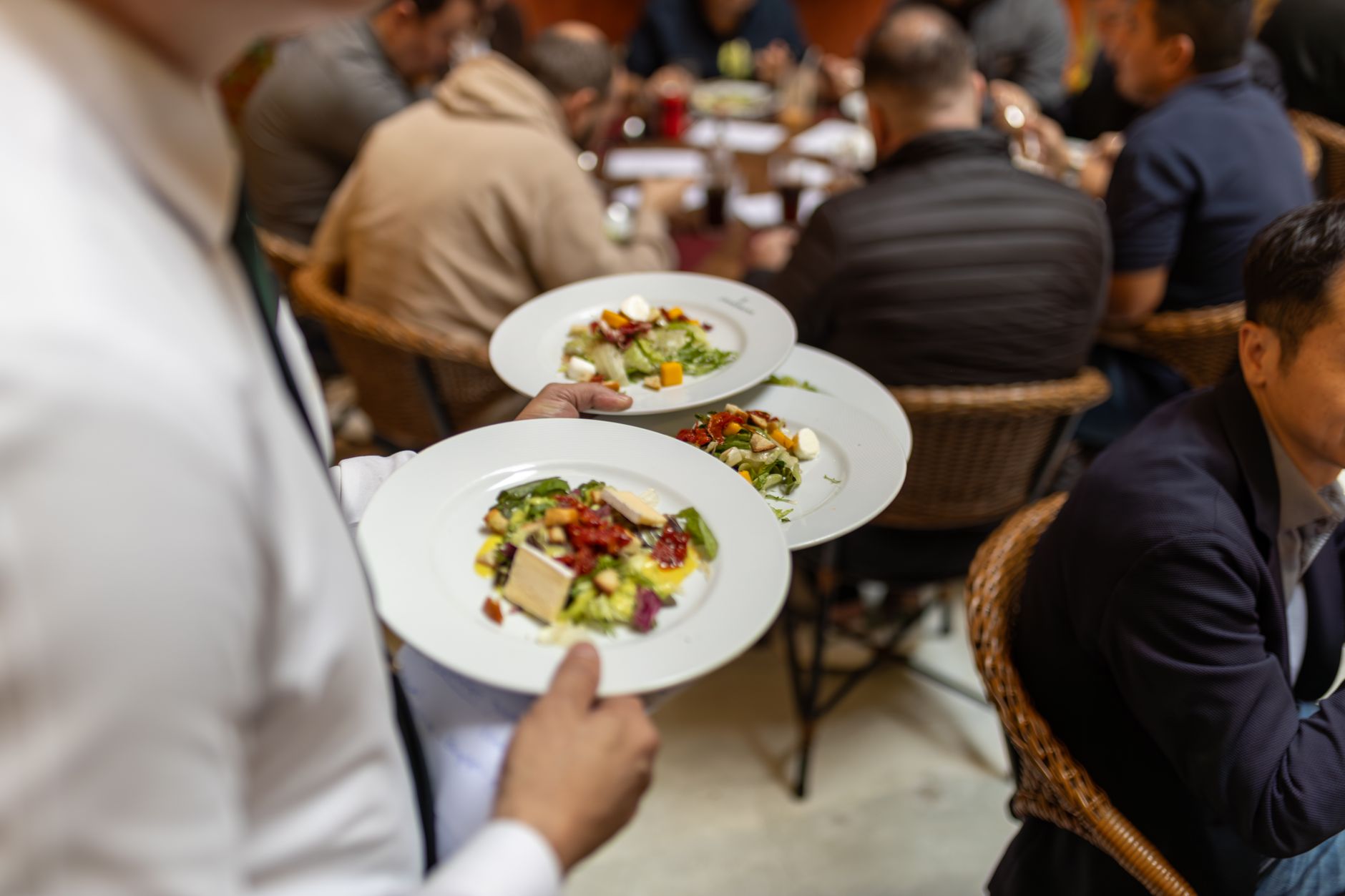 Food running paths between kitchen and tables that robots can share with the team.
