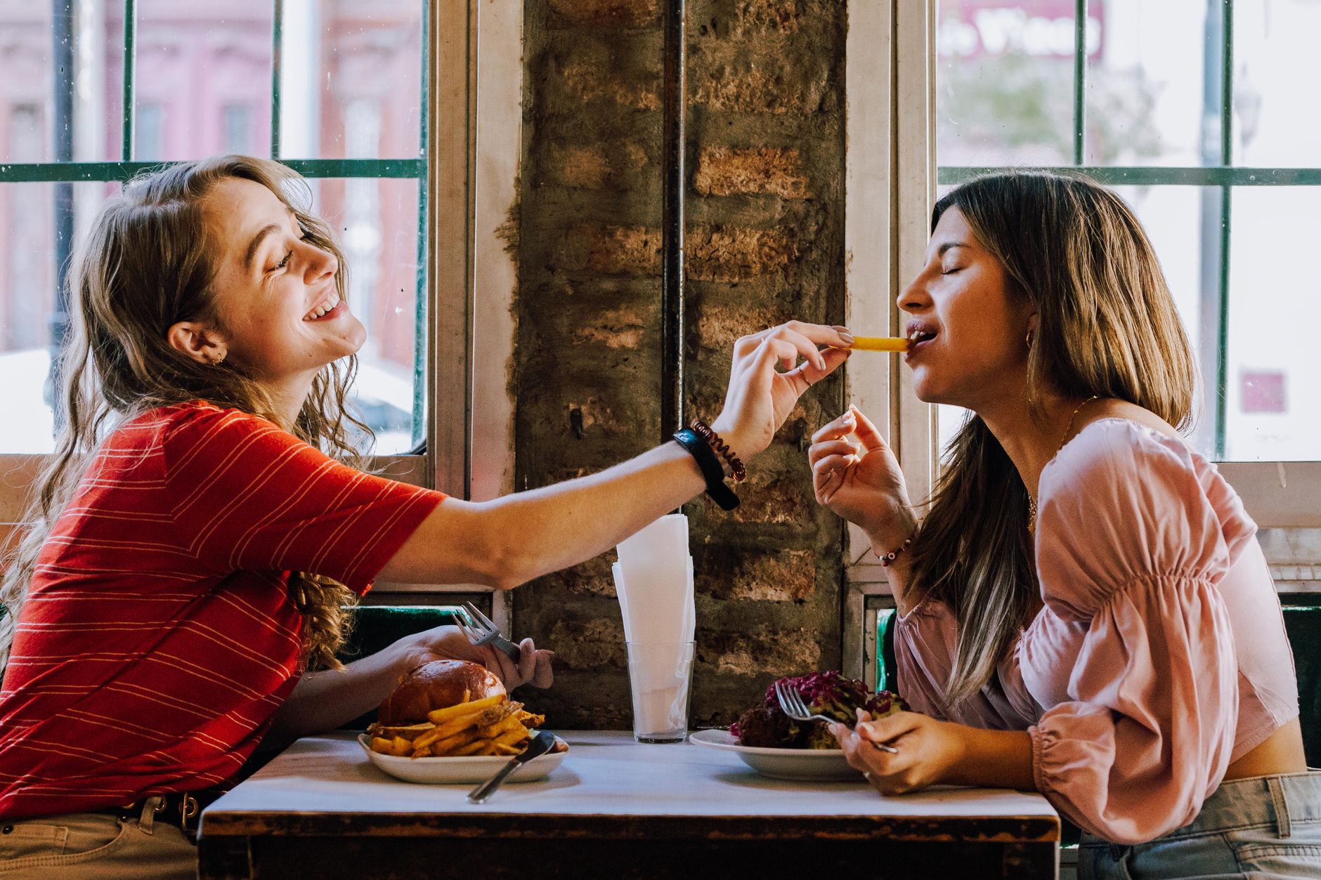 Guests dining while servers spend more table time after robot-assisted running.