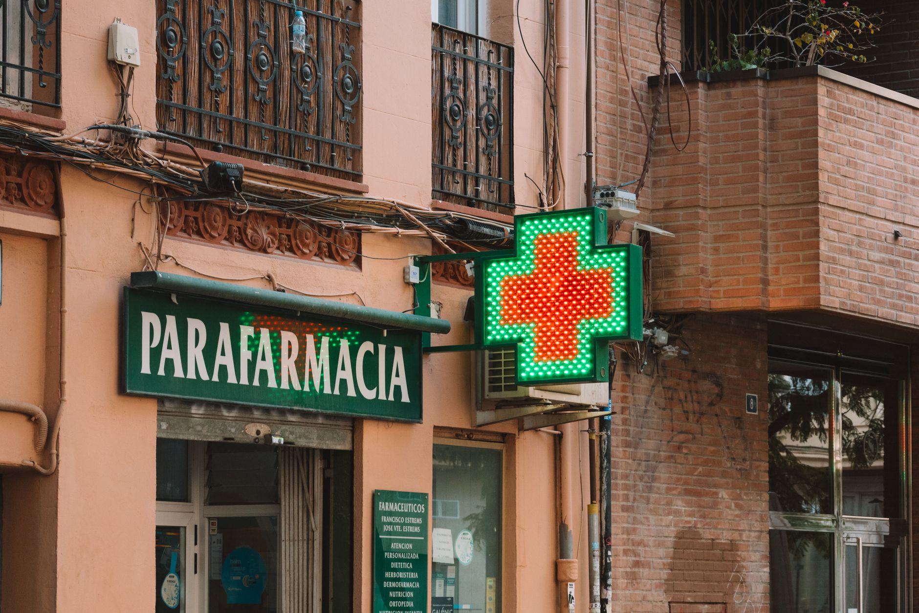 The exterior of an independent community pharmacy serving local customers.
