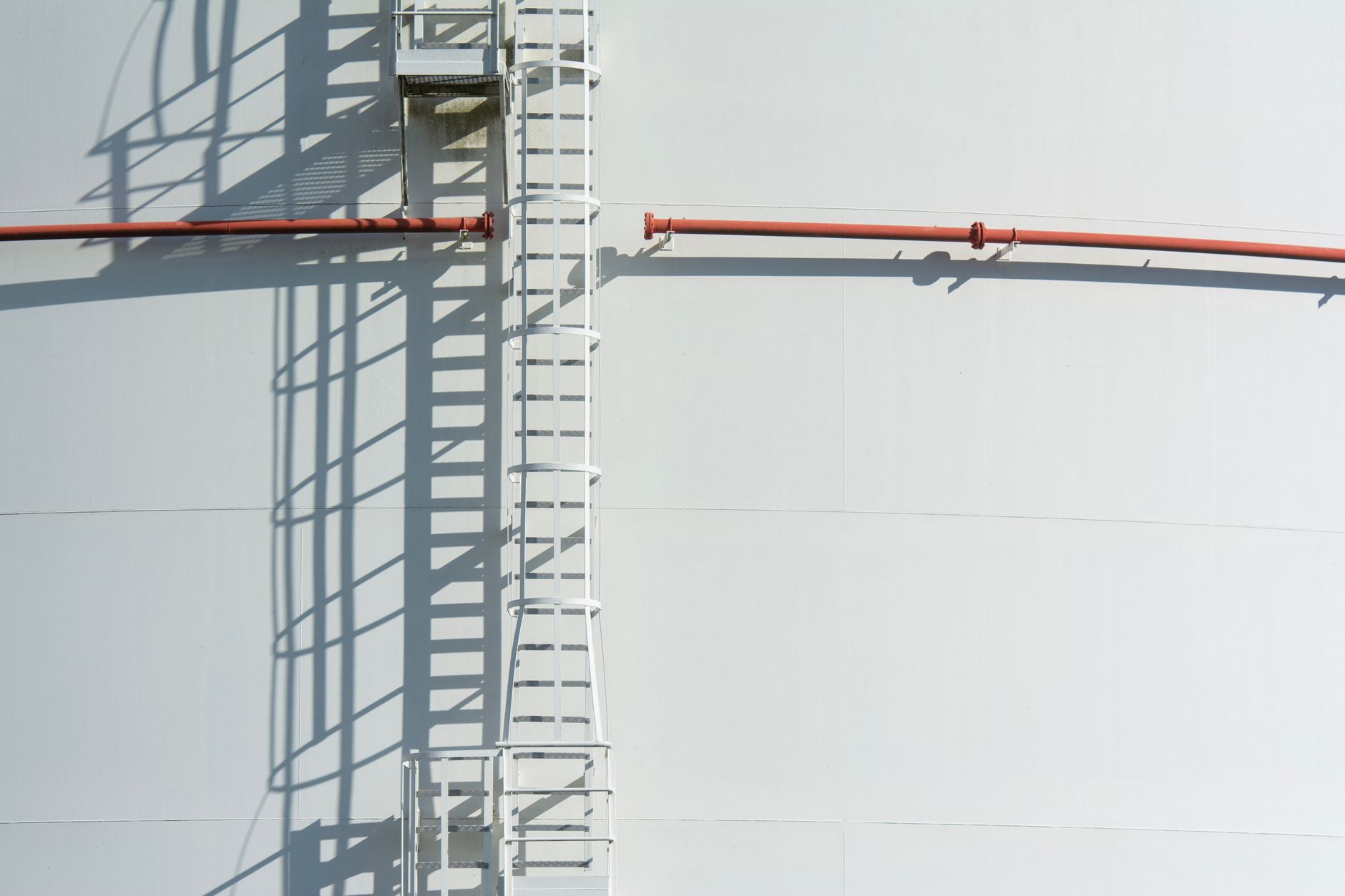 A tank manway and ladder where inspectors once entered confined stainless vessels.