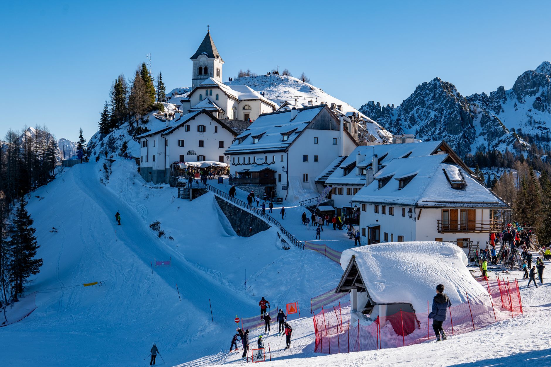 Snow-covered alpine resort streets that bring grit into hotel entries.